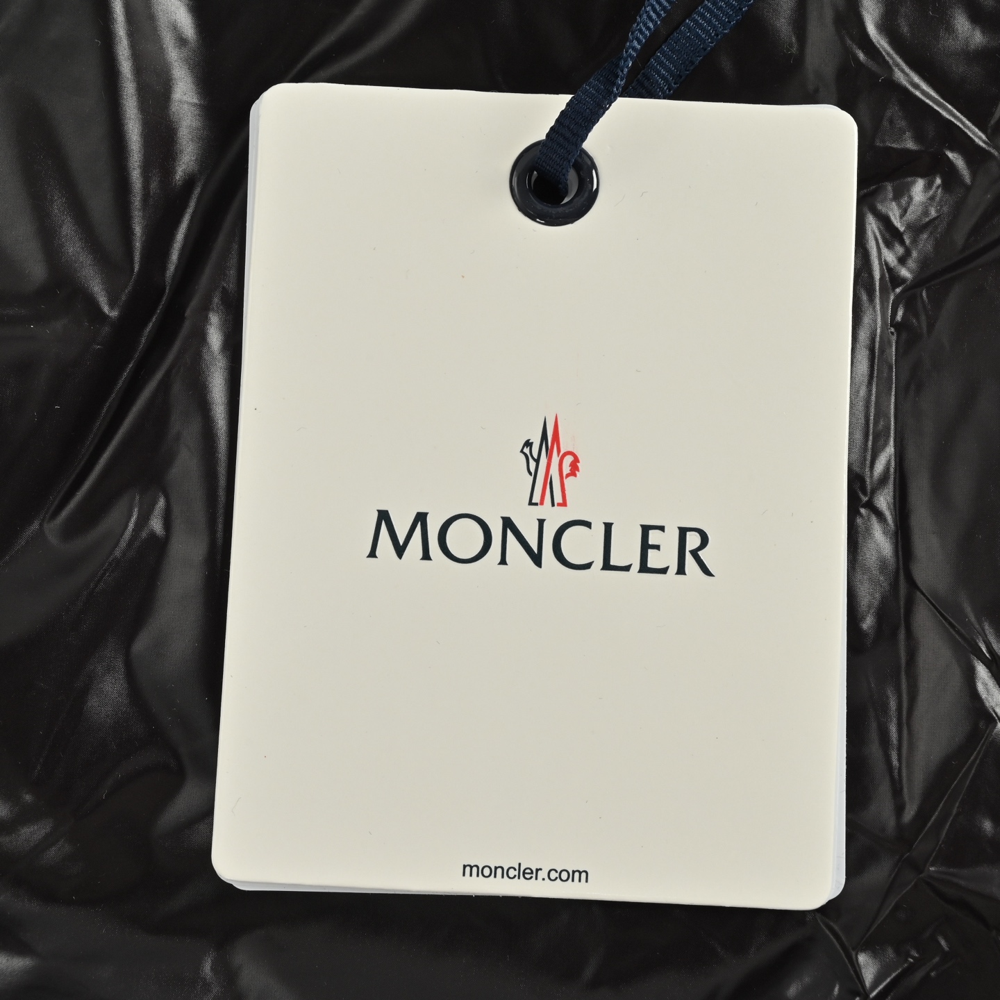 Moncler/蒙口 中长款手臂大标羽绒服