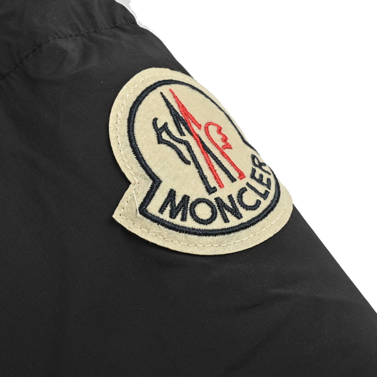 Moncler/蒙口 中长款手臂大标羽绒服