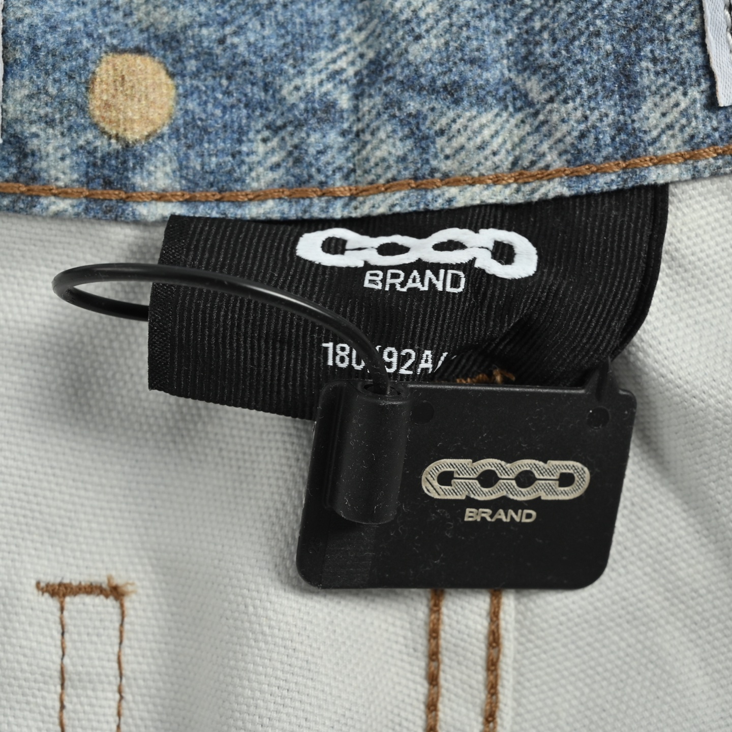 GOODBRAND 浪语者徽章印花牛仔裤