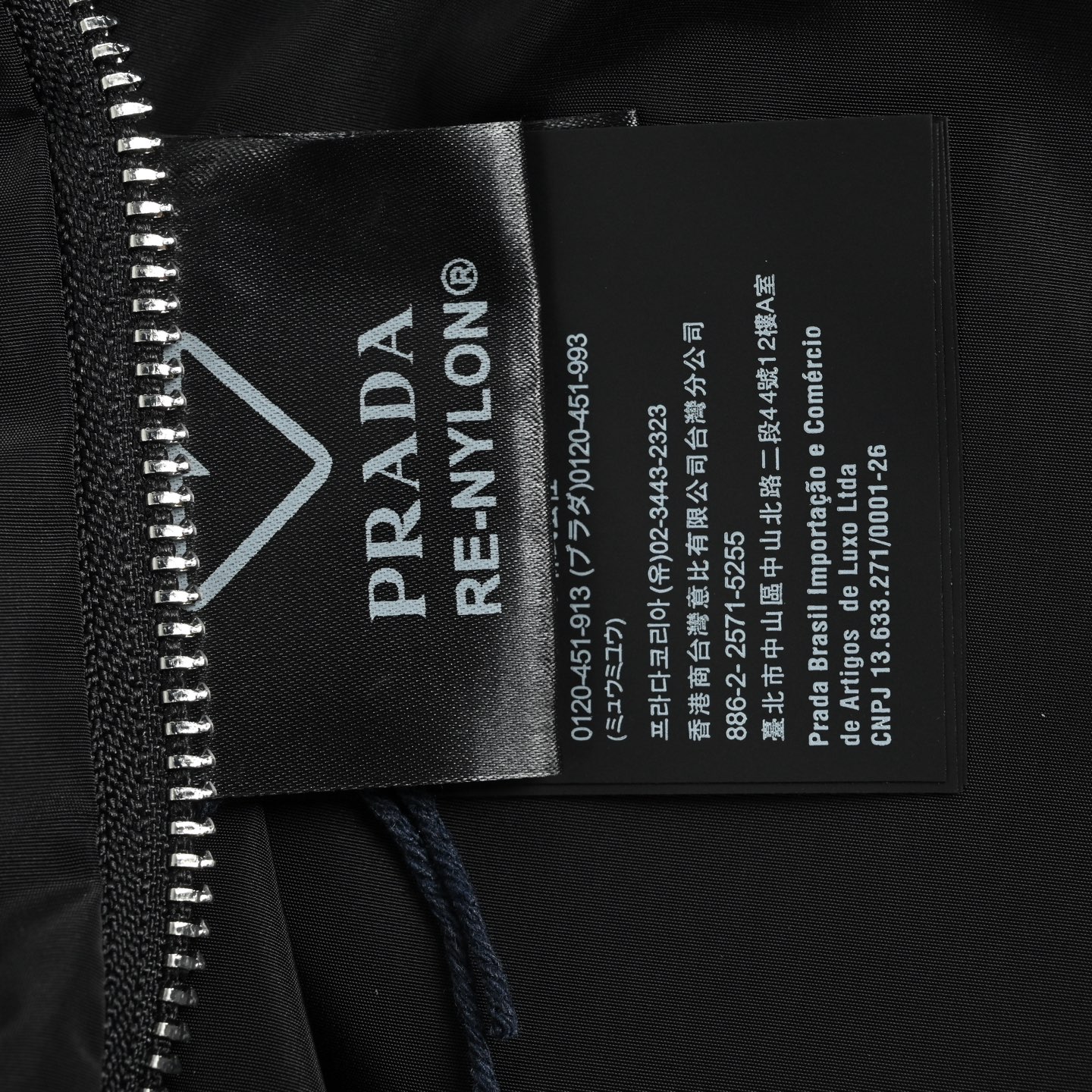 Prada/普拉达 25Fw 双面穿皮革尼龙连帽夹克外套