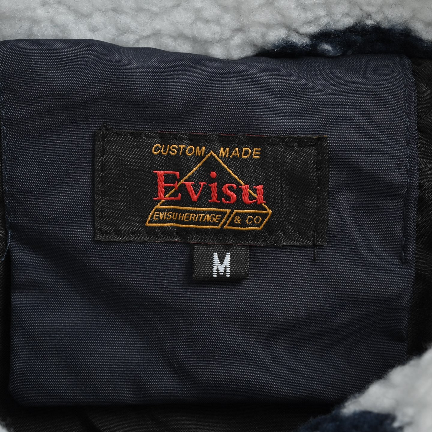Evisu/福神 25Fw 满印羊羔绒外套 EVISU的拉链外套以提花面料打造