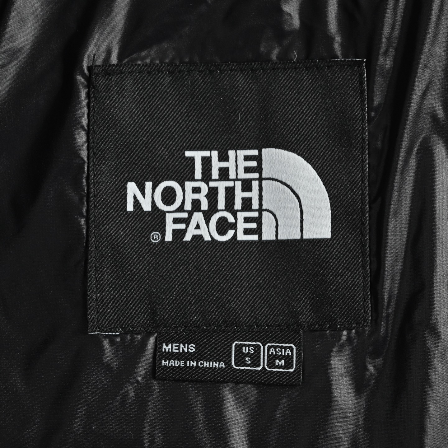 The North Face/北面 25Fw UE设计师款拼接连帽羽绒服宇宙黑 乌木绿