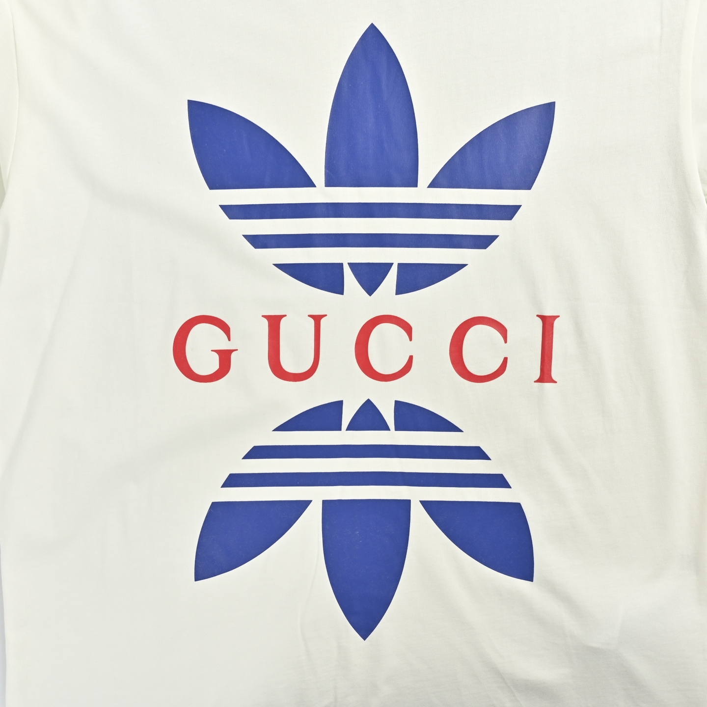 Gucci 古驰 联名三叶草印花短袖-Chinese UA Cheap High Quatity Brand Clothes Bags handbags Sneakers wholesale wholesaler seller from China Factory suppliers Fashion Clothing Shoes best Quality Beautiful Price Gucci 古驰 联名三叶草印花短袖