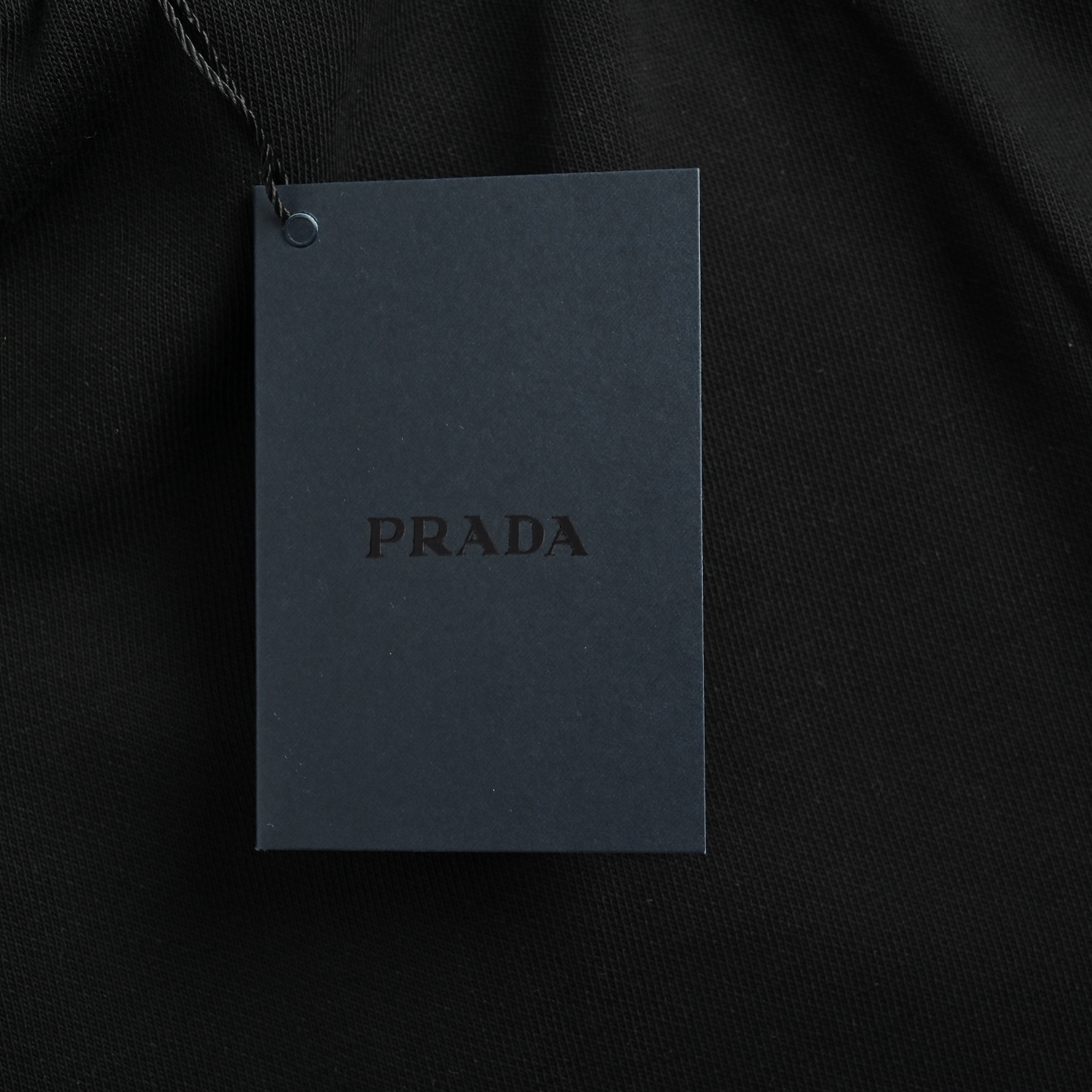 Prada/普拉达 下摆条纹拼接三角标短裤 白色 黑色