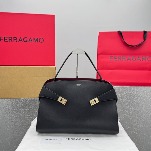 Ferragamo Black Hug Soft Handbag with Gold Hardware - Stylish and Functional 1 Ferragamo Black Hug Soft Handbag with Gold Hardware - Stylish and Functional