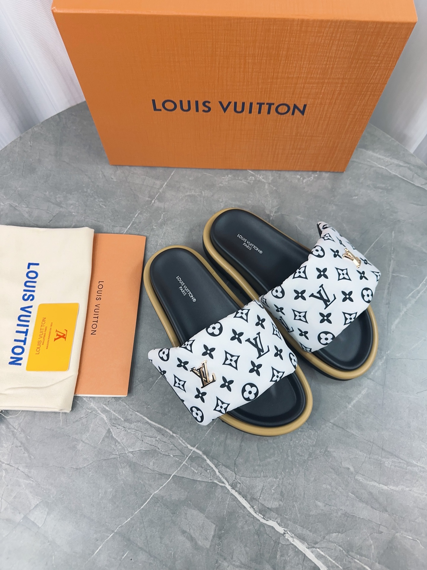 Louis Vuitton Pool Pillow Comfort Flat Sandal Monogram Embossed Slides 7 i1703165616 4820 0
