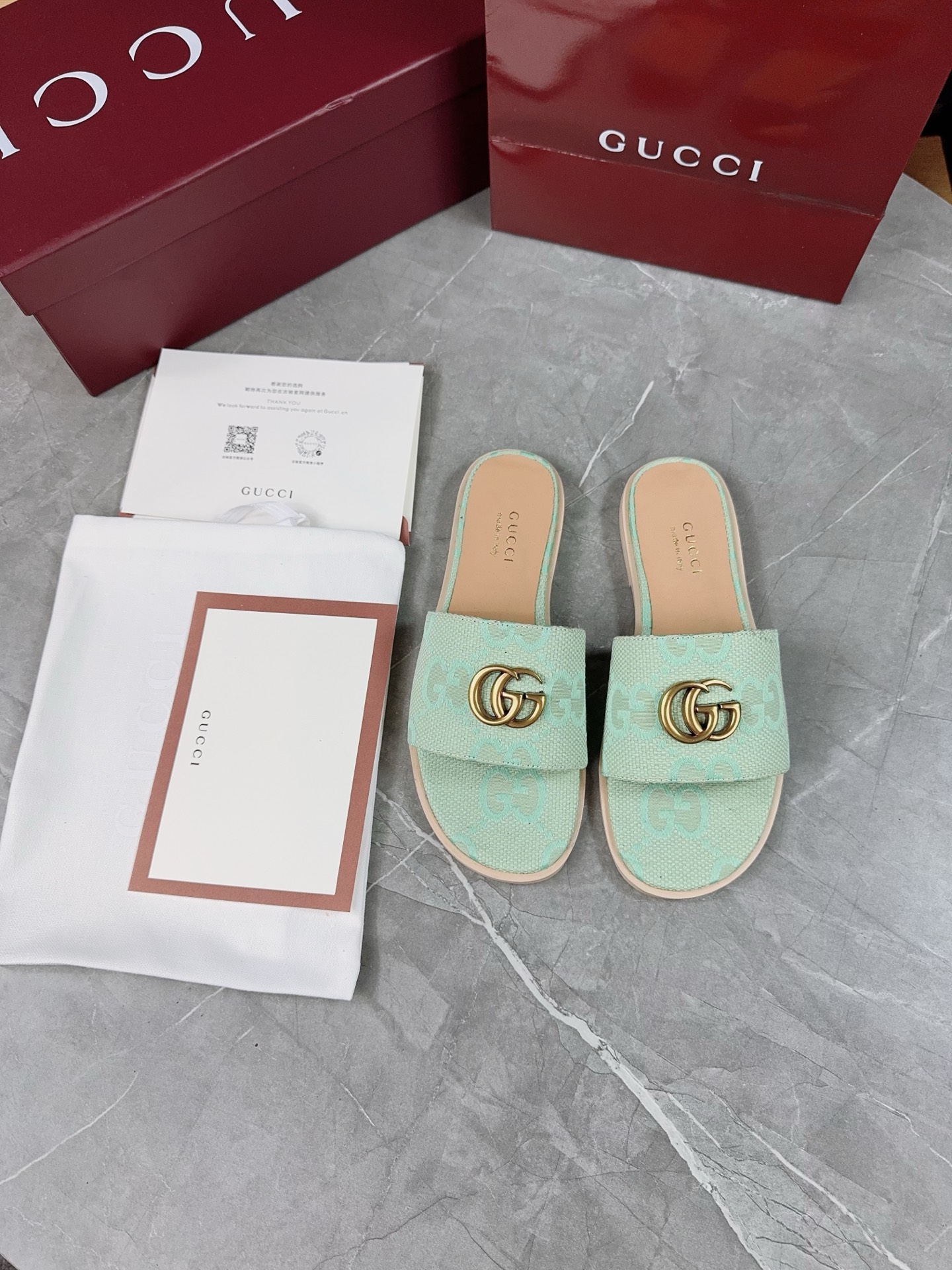 Gucci Women's Flat Sandals with GG Motif - Stylish Summer Slides 3 i1741067203934 2874 0 1