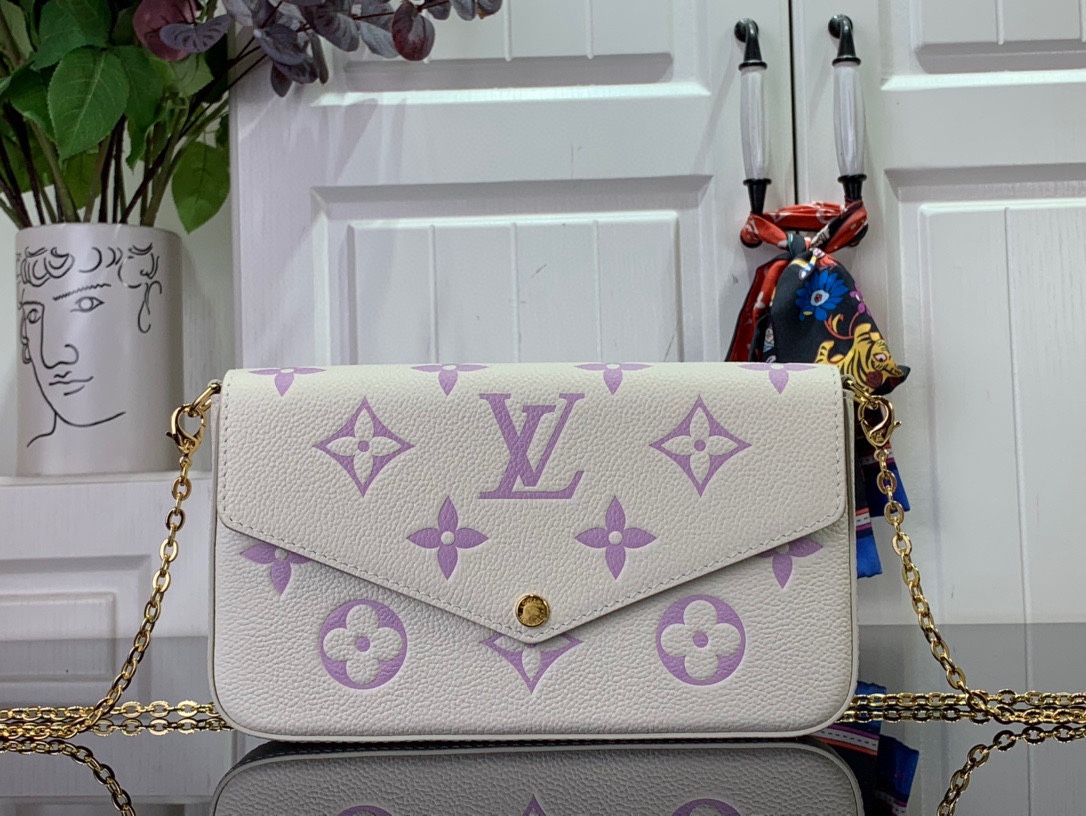 Louis Vuitton LV Pochette FeLicie Bolsos cruzados y bandoleras Azul Lila Morado Empreinte​ Cadena M83025