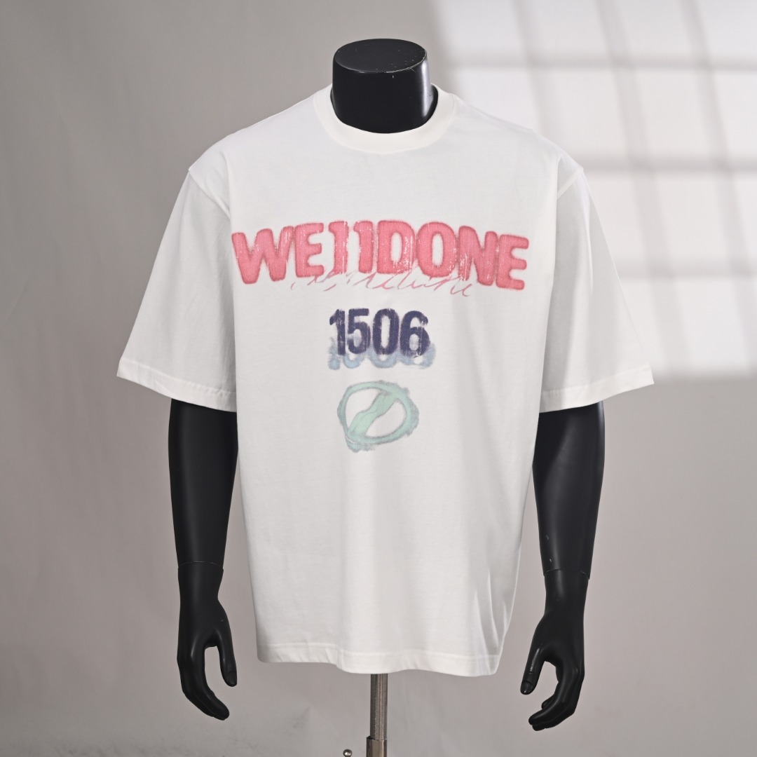 Camiseta de manga corta WE11DONE con estampado de spray de colores, foto real
