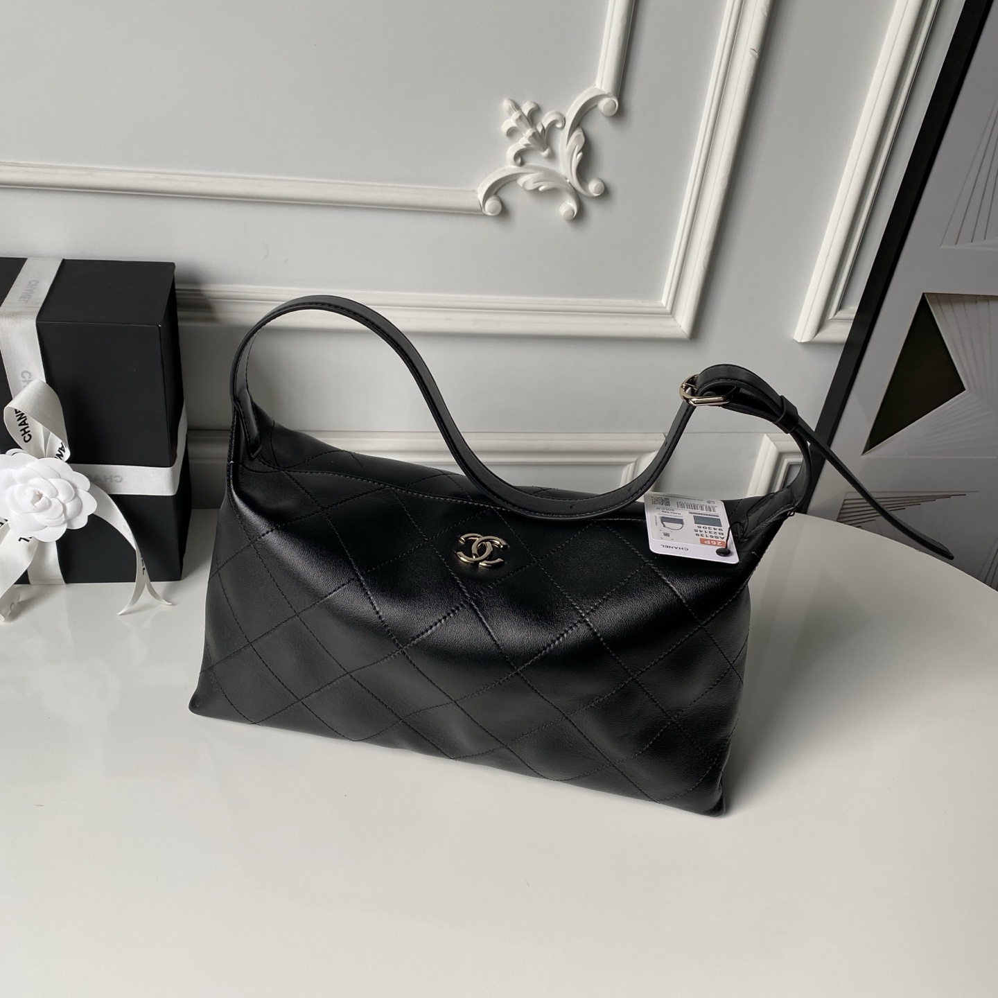 Chanel Style Black Leather Hobo Bag style reference detail image 1 from source 776556