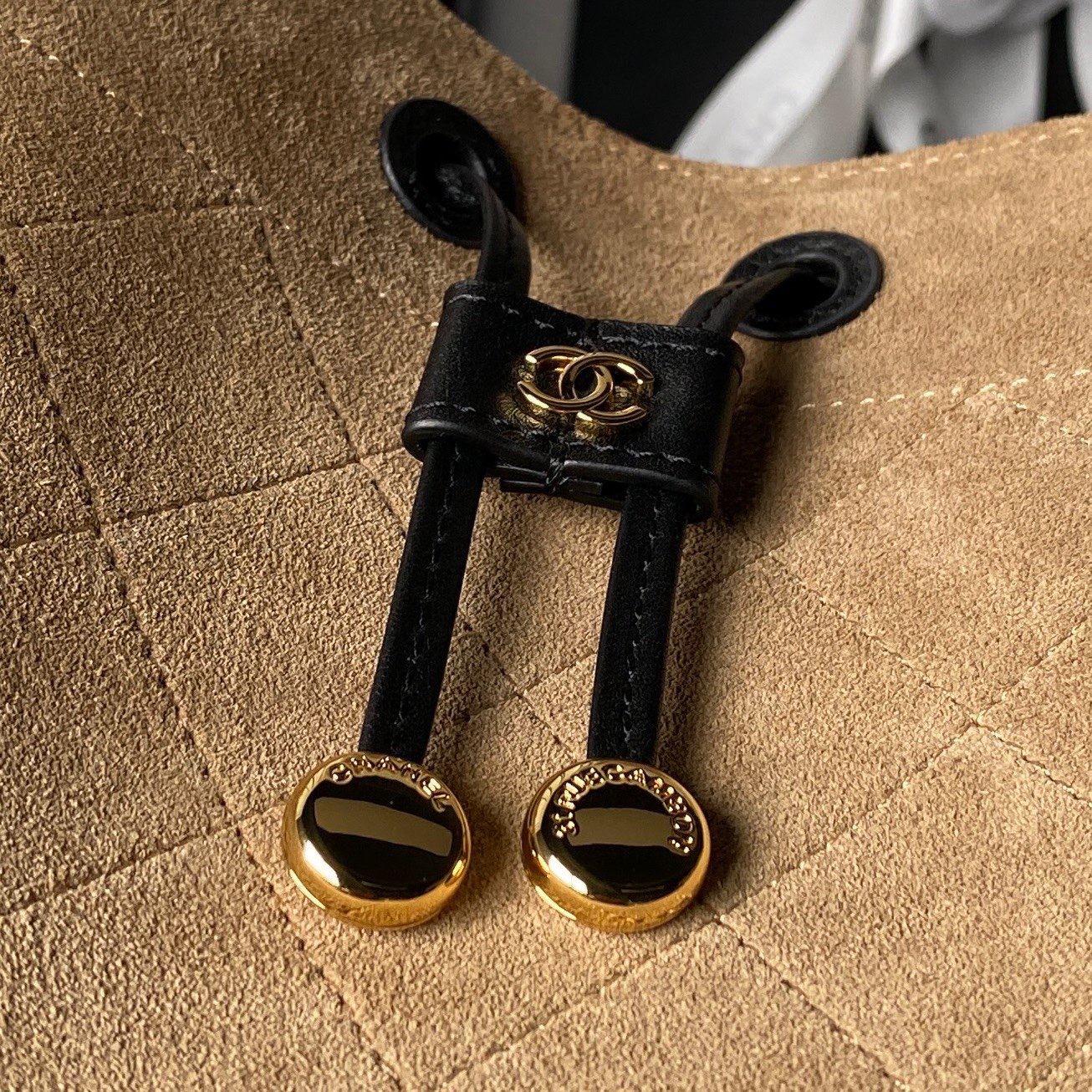 Gold-Tone Quilted Drawstring Bucket Bag
