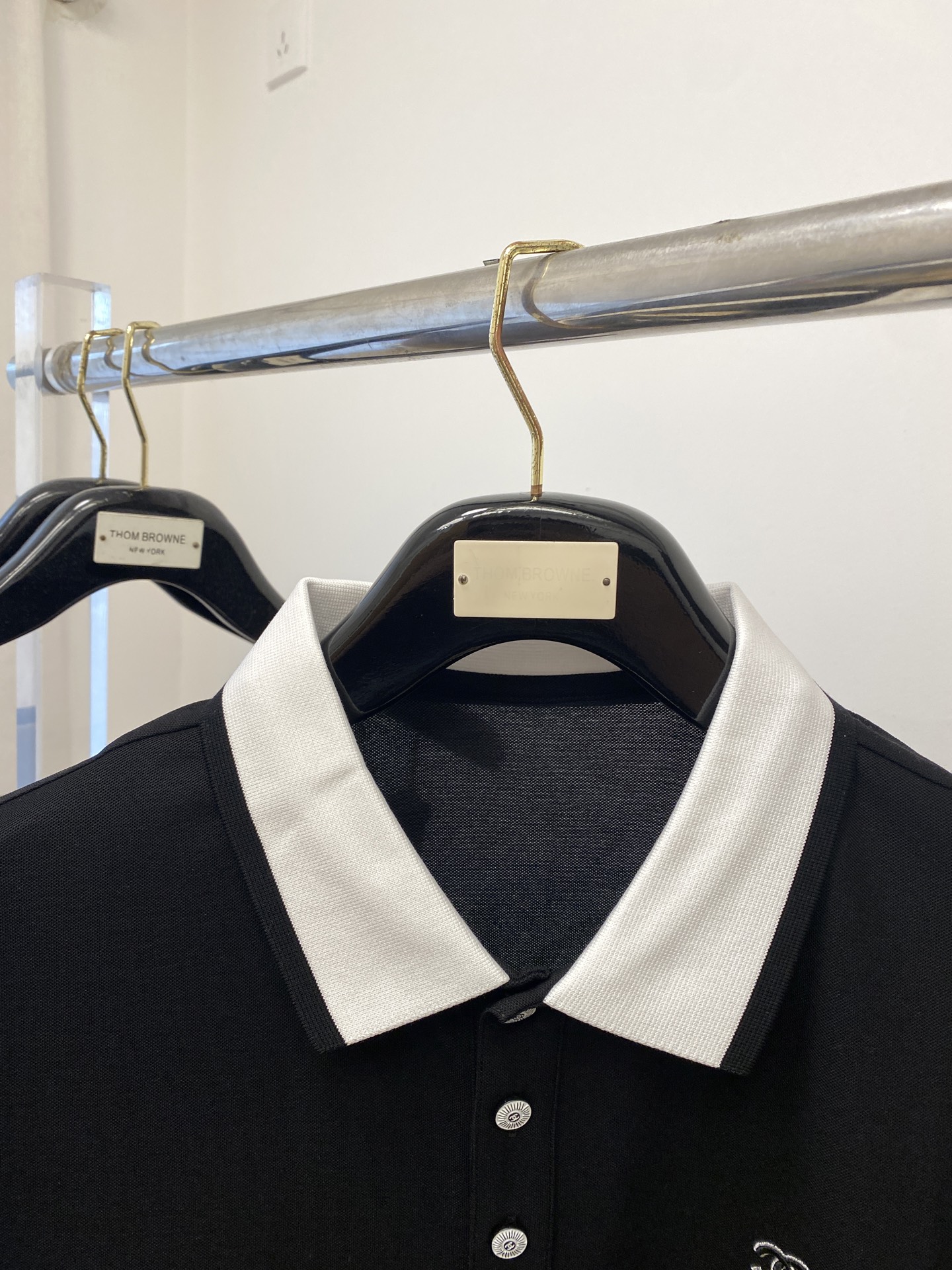 Elegant Chanel Women's Black Polo Shirt with Embroidered Logo - Stylish and Versatile 3 i1744627564628 4058 0 1
