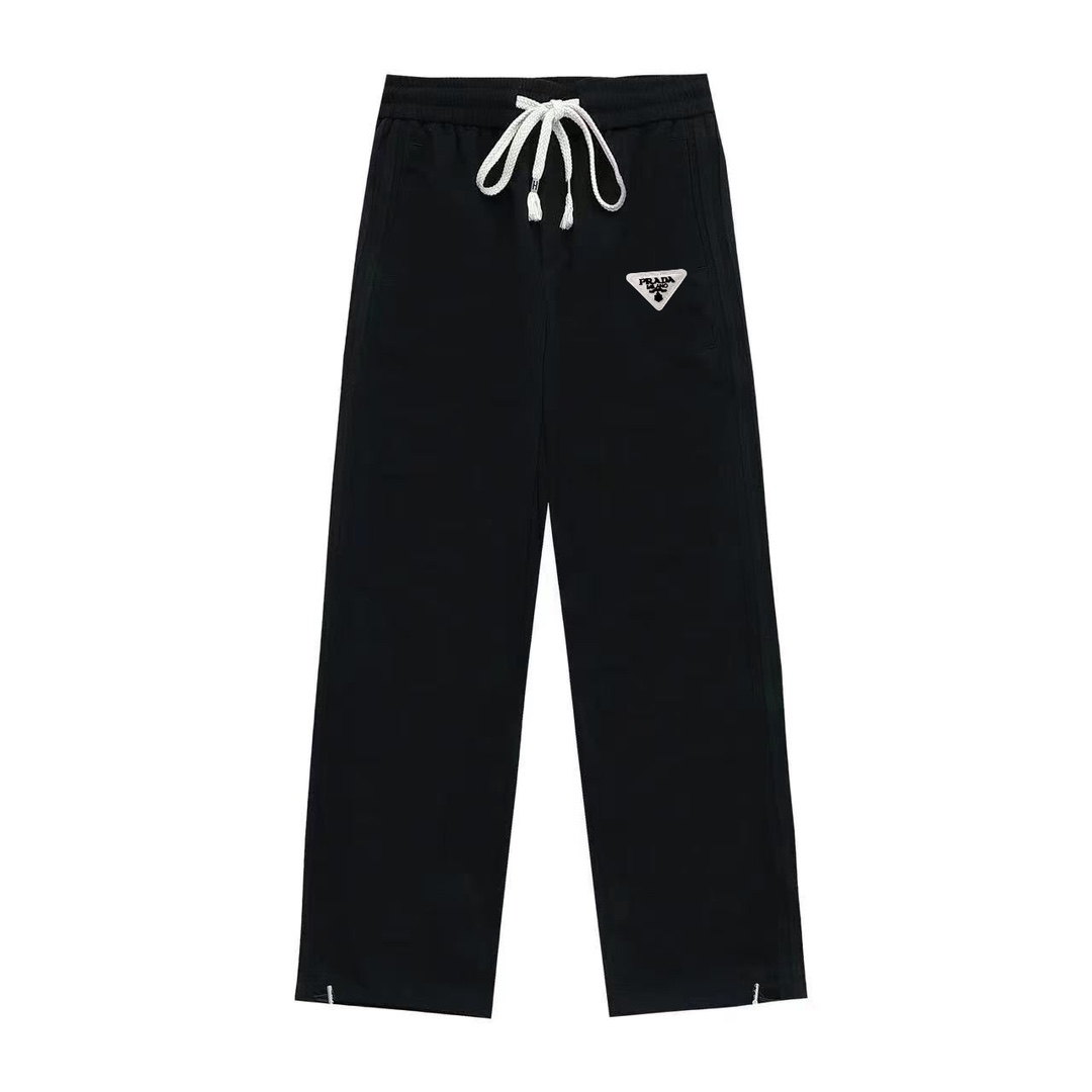 Prada nuevo estilo de calle con cremallera y pantalones deportivos casuales de pierna recta, no solo tiene la garantía …