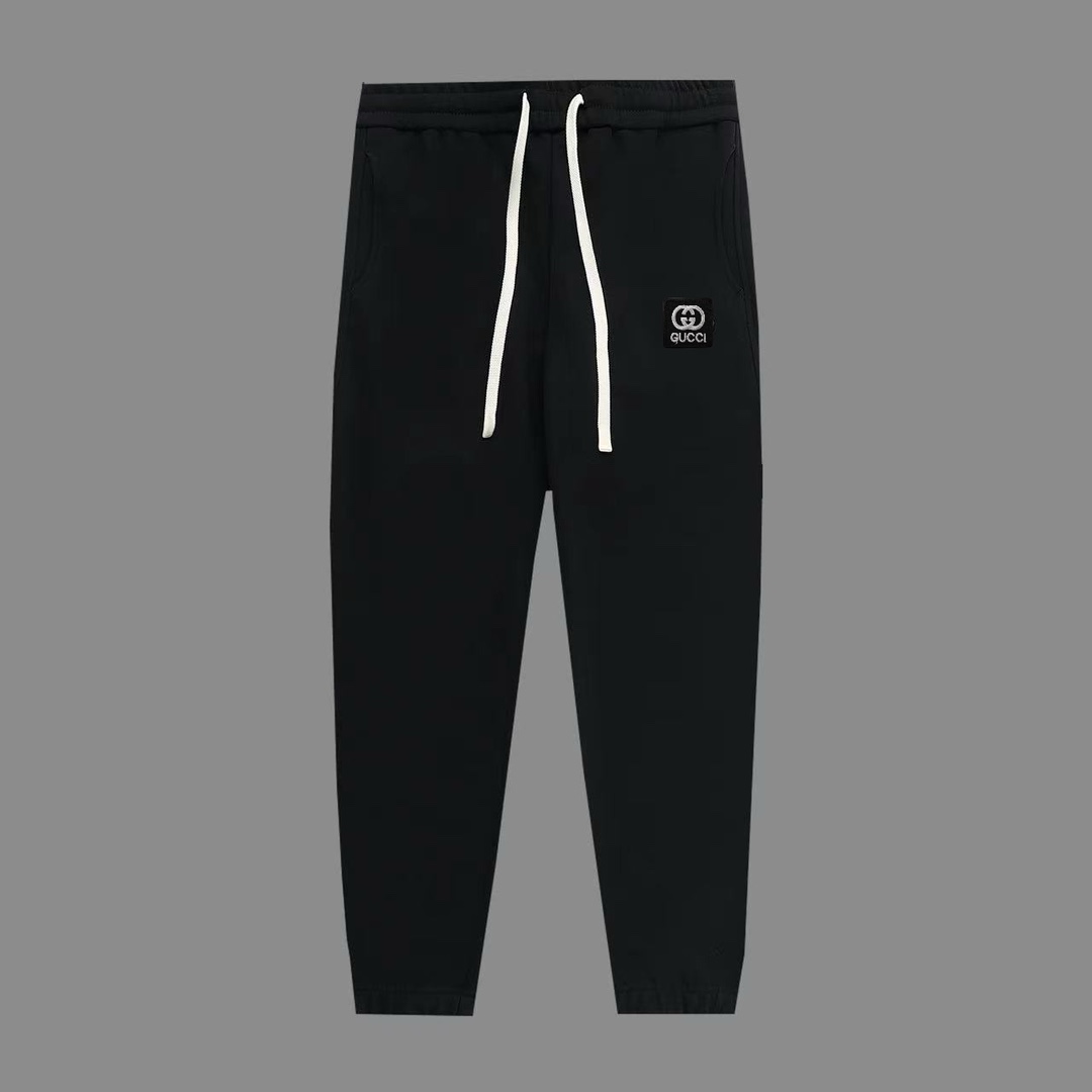 （顶级版本，区别通货）古奇 秋冬季秀款 修身线条简约字母Logo运动裤 380g克重 兼容所有身材 腰部松紧带黑白抽绳设计 定制抽绳口袋两侧都带有斜插口袋设计 后部还带有一个小口袋 颜色：黑色 巴黎灰色 浅灰 深灰 尺码 29-36