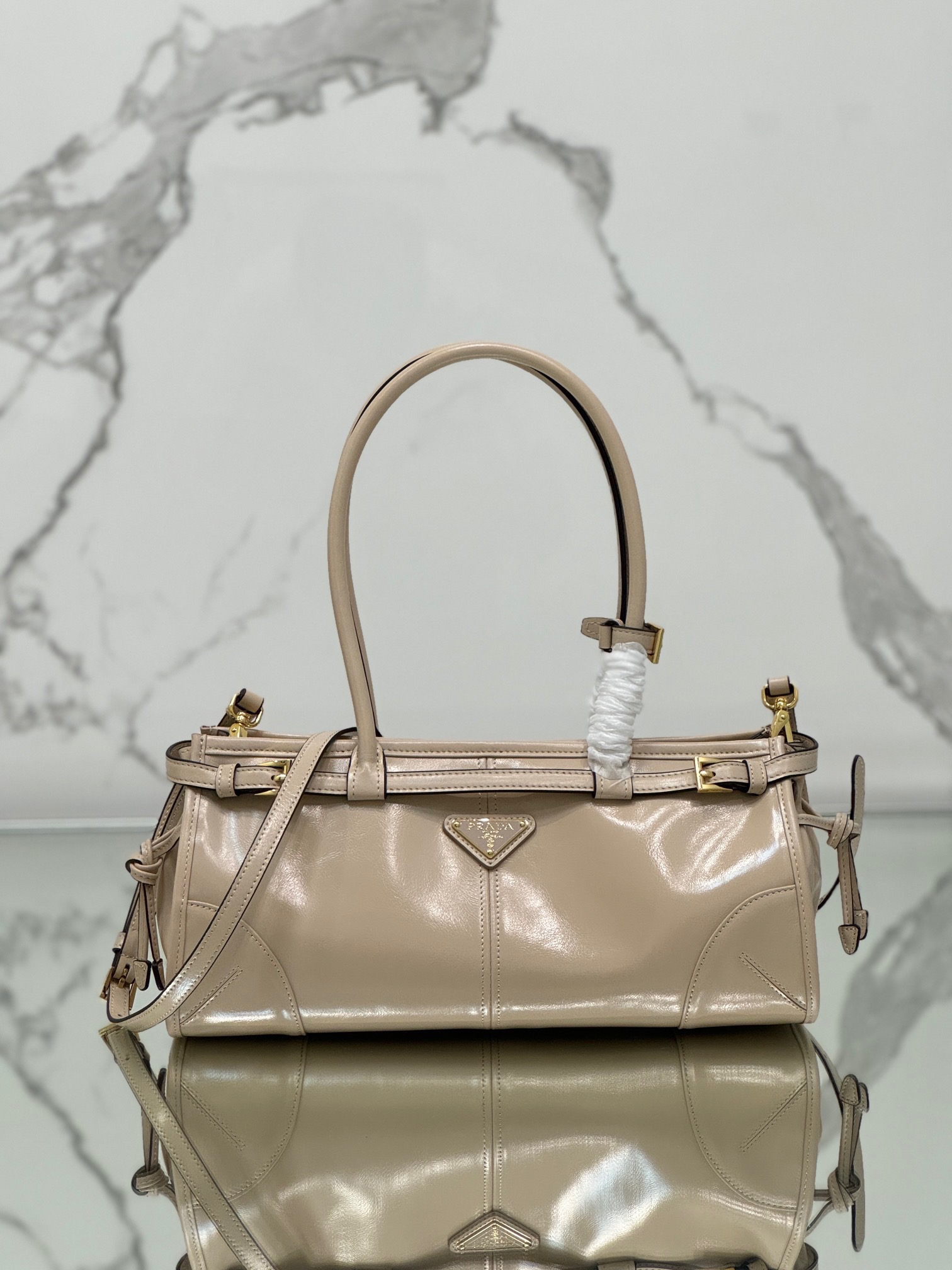 P Brand Small Tote Bag 1BA426. This Luxsoft handbag features imported first-layer waxed cowhide, logo lining, and premium hardware. Comes with a detachable adjustable long shoulder strap, one interior zip pocket, very spacious, ultra-lightweight, and versatile. Dimensions: 32 x 15.5 x 12 cm. 007980 image 1