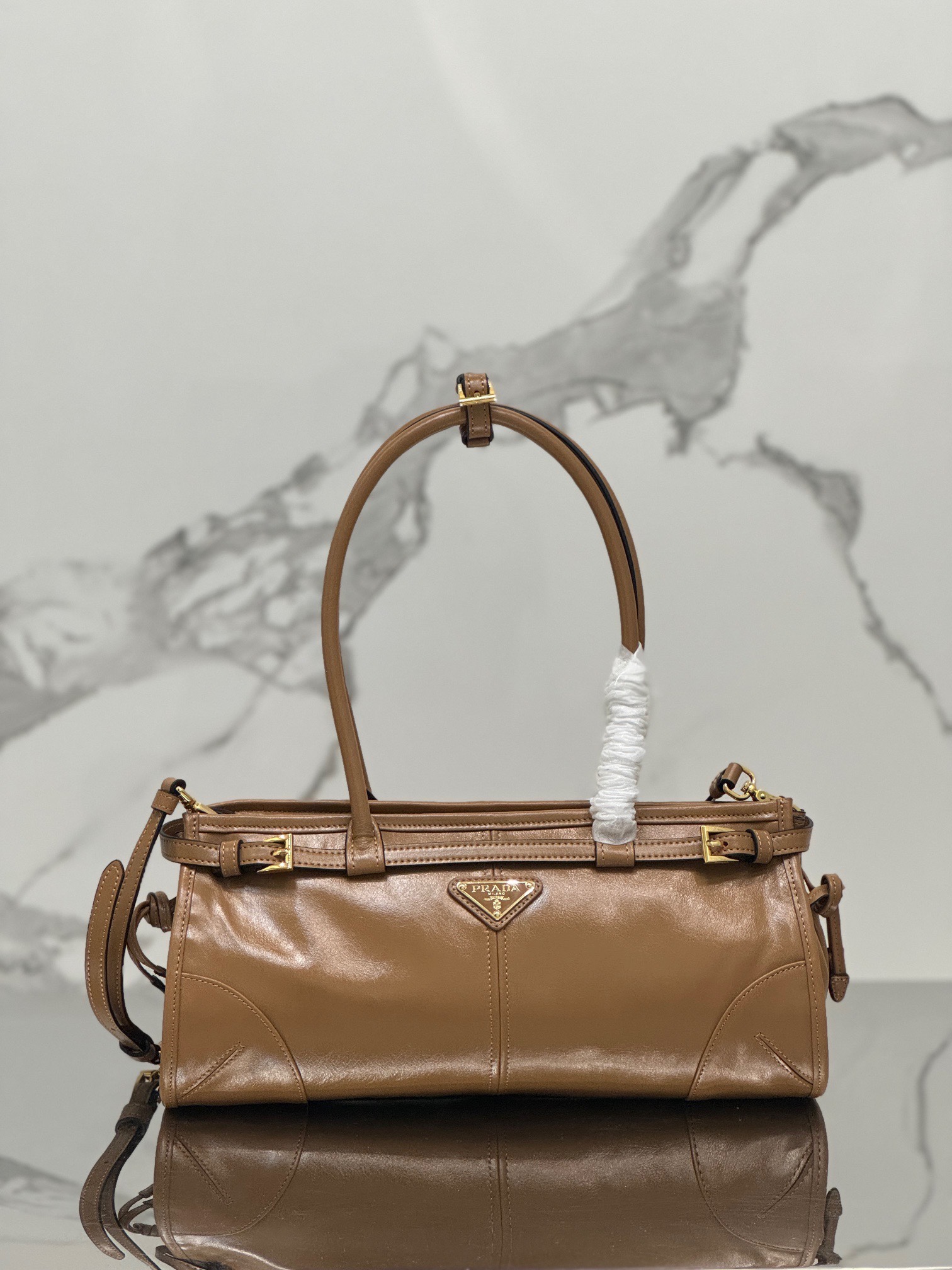 P Brand Small Tote Bag 1BA426. This Luxsoft handbag features imported first-layer waxed cowhide, logo lining, and premium hardware. Comes with a detachable adjustable long shoulder strap, one interior zip pocket, very spacious, ultra-lightweight, and versatile. Dimensions: 32 x 15.5 x 12 cm. 007980 image 1