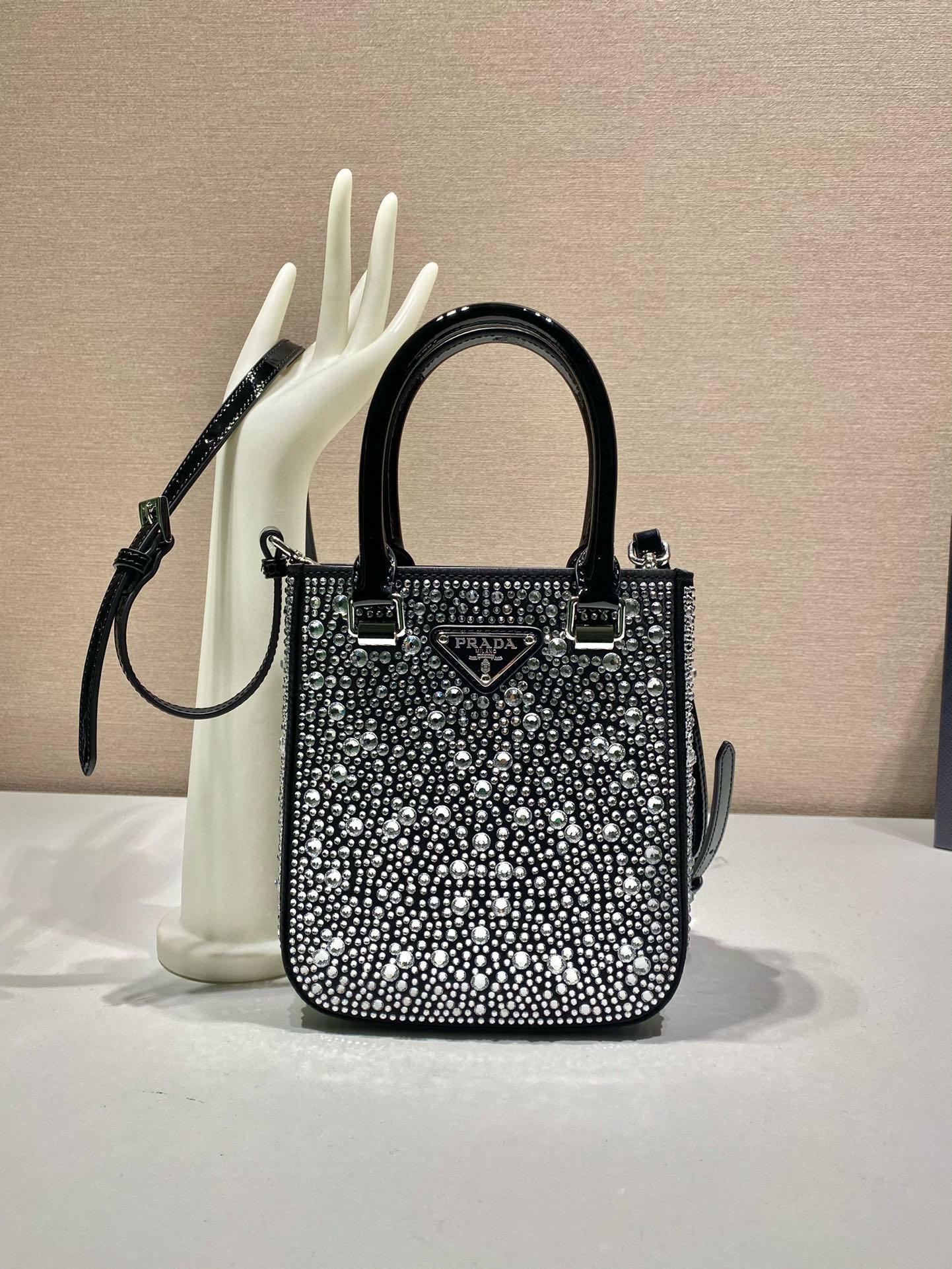 P Brand Sparkling Diamond Tote Bag 1BG331. This satin sparkling diamond tote bag features imported crystals, satin lining, top-grade hardware, and cowhide handles. Comes with a detachable adjustable cowhide shoulder strap, an interior patch pocket, suitable for hand-carrying or crossbody. Dimensions: 17.5 x 15 x 5. Item number: 007990. image 1