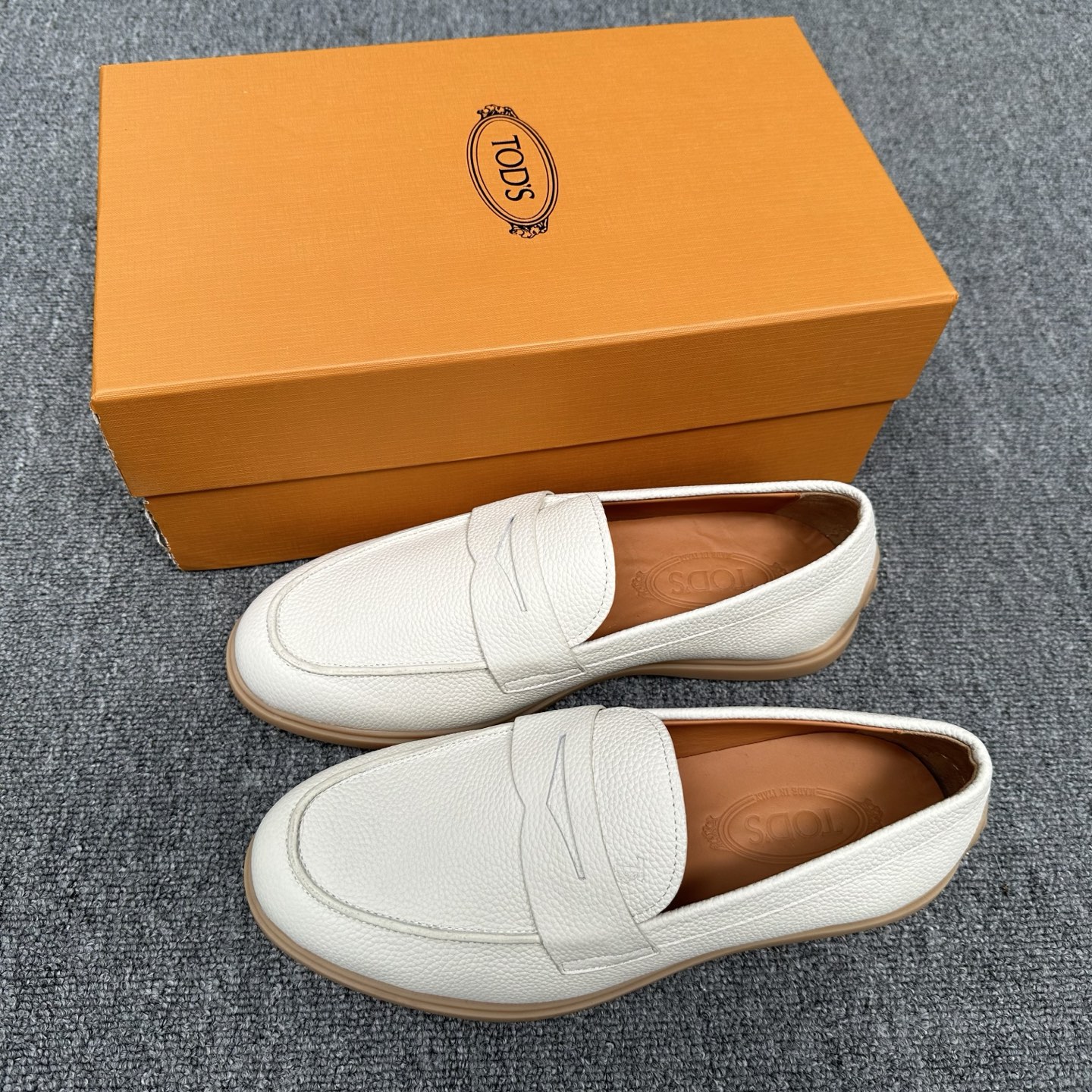 Мужские кожаные мокасины Tod's белого цвета