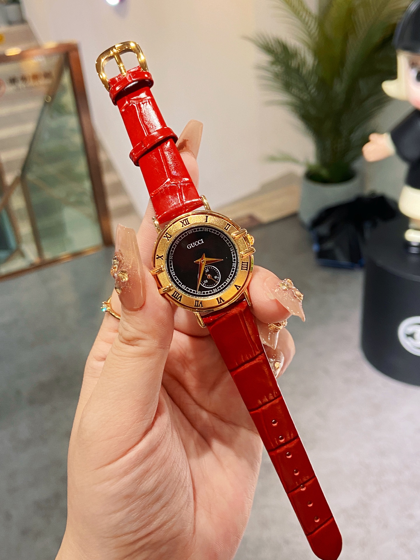Gucci Women's Watch with Red Leather Band and Gold-Tone Case - Elegant Timepiece