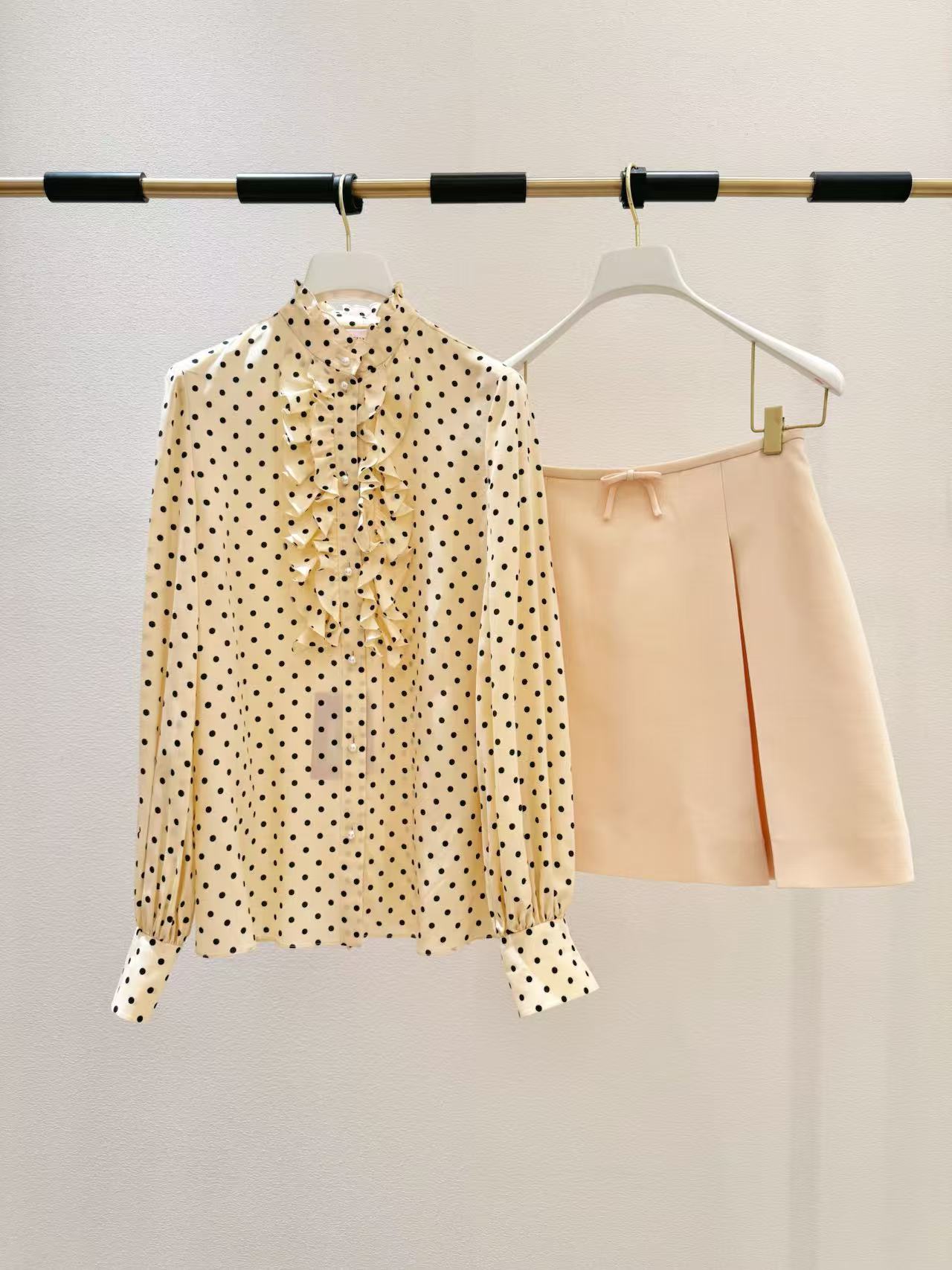 Elegant Polka Dot Blouse with Ruffle Neckline and Pearl Details – Retro Chic