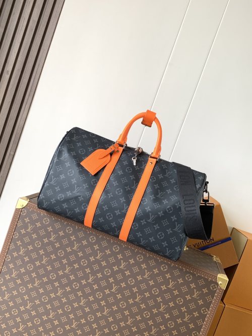 Louis Vuitton Keepall Bandoulière 45 Monogram Eclipse Travel Bag With Orange Trim 1 Louis Vuitton Keepall Bandoulière 45 Monogram Eclipse Travel Bag With Orange Trim