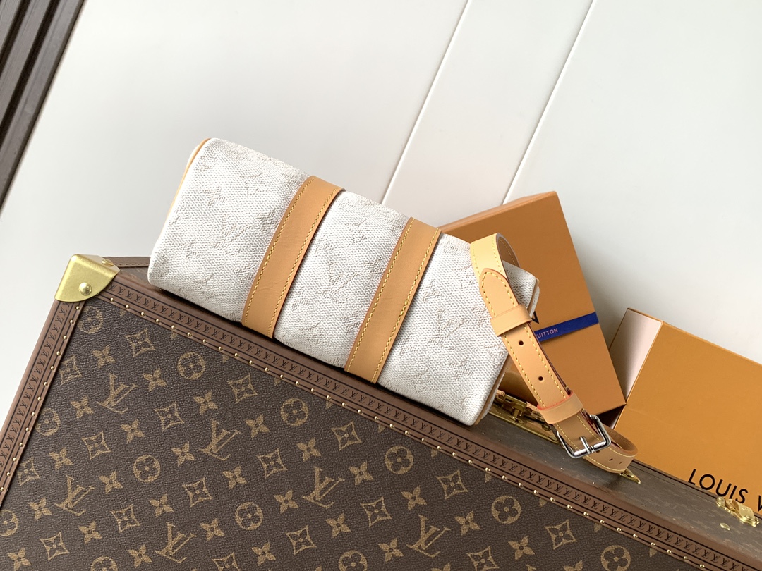 Louis Vuitton M27161 变码芯片163C 本款 Keepall Bandoulière 25 手袋浓缩 Keepall 旅行袋设计