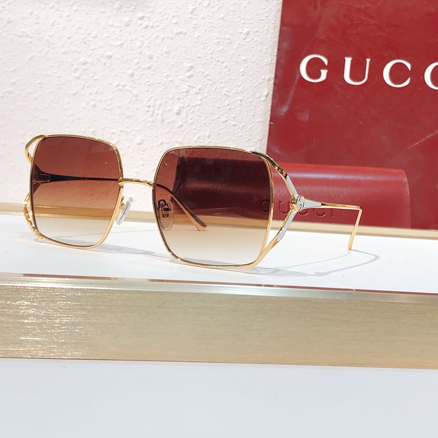 Gucci GUCC*