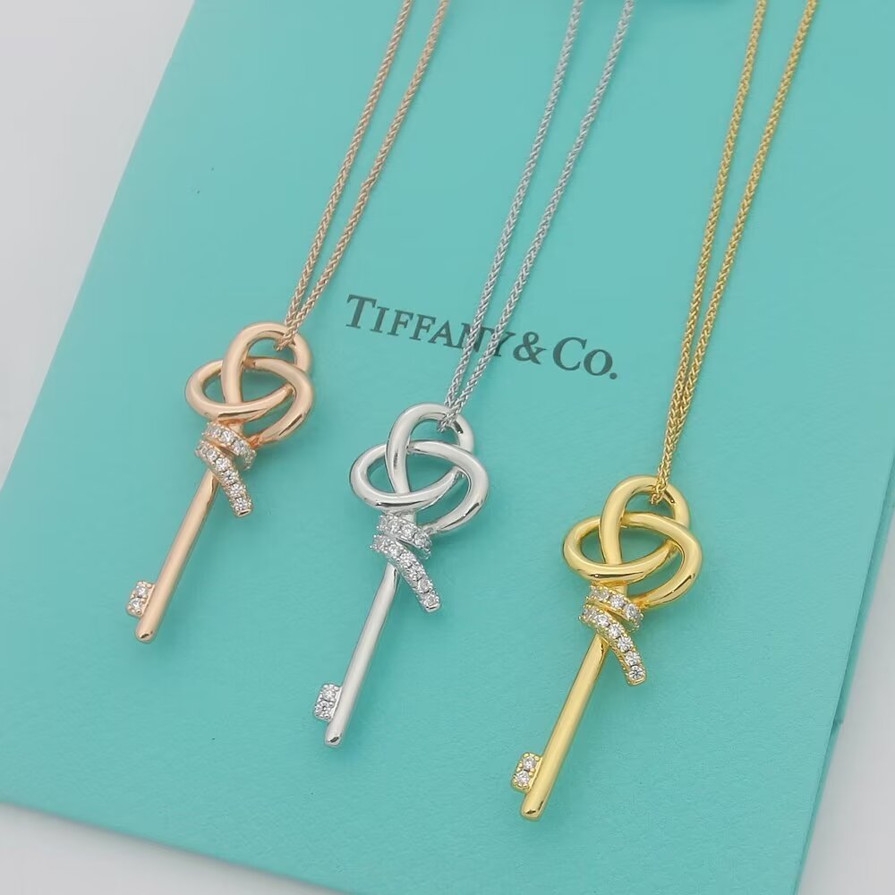 Tiffany Co Woven Keys necklace 18k rose gold with diamond accents 18 inches