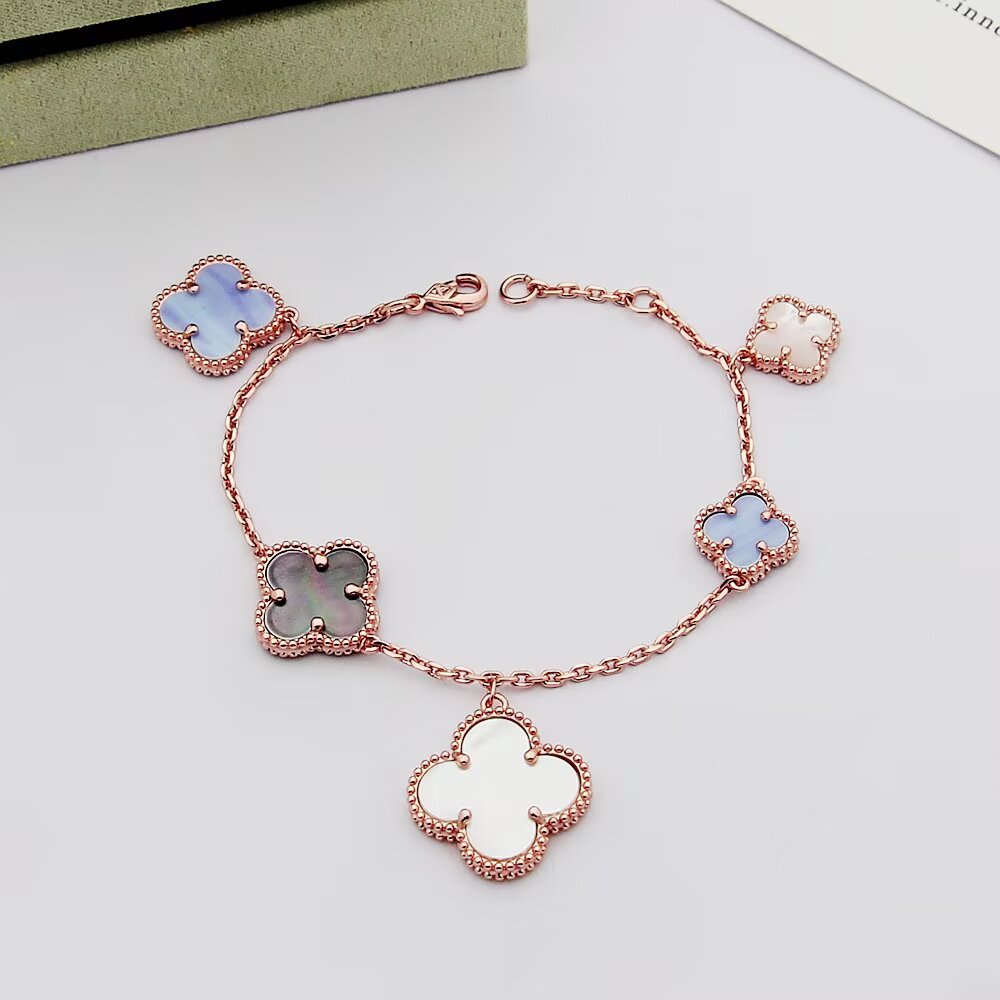 Van Cleef Arpels Magic Alhambra bracelet Silver-toned metal with white mother-of-pearl purple chalcedony and gray mother-of-pearl clover motifs 19cm