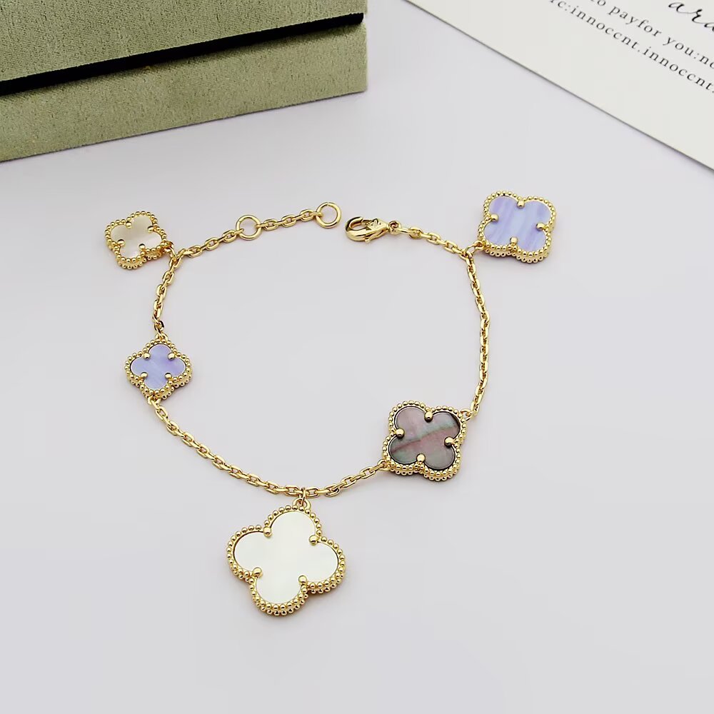 Van Cleef Arpels Magic Alhambra bracelet Silver-toned metal with white mother-of-pearl purple chalcedony and gray mother-of-pearl clover motifs 19cm