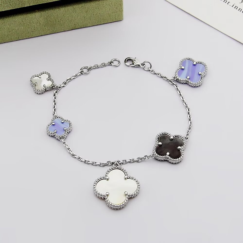 Van Cleef Arpels Magic Alhambra bracelet Silver-toned metal with white mother-of-pearl purple chalcedony and gray mother-of-pearl clover motifs 19cm