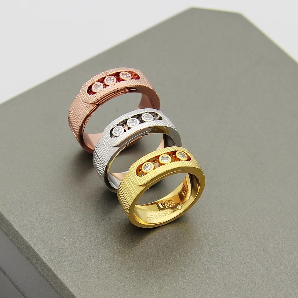 Messika Move Noa ring 18k yellow gold 18k white gold 18k rose gold with clear round diamonds brushed textured metal finish 6 7 8 9
