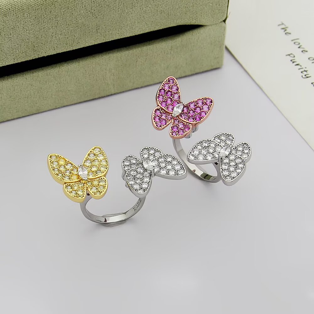 Anillo Van Cleef Arpels Two Butterfly Oro blanco de 18 k con diamantes incoloros Oro rosa de 18 k con zafiros rosados Oro amarillo de 18 k con zafiros amarillos US 7