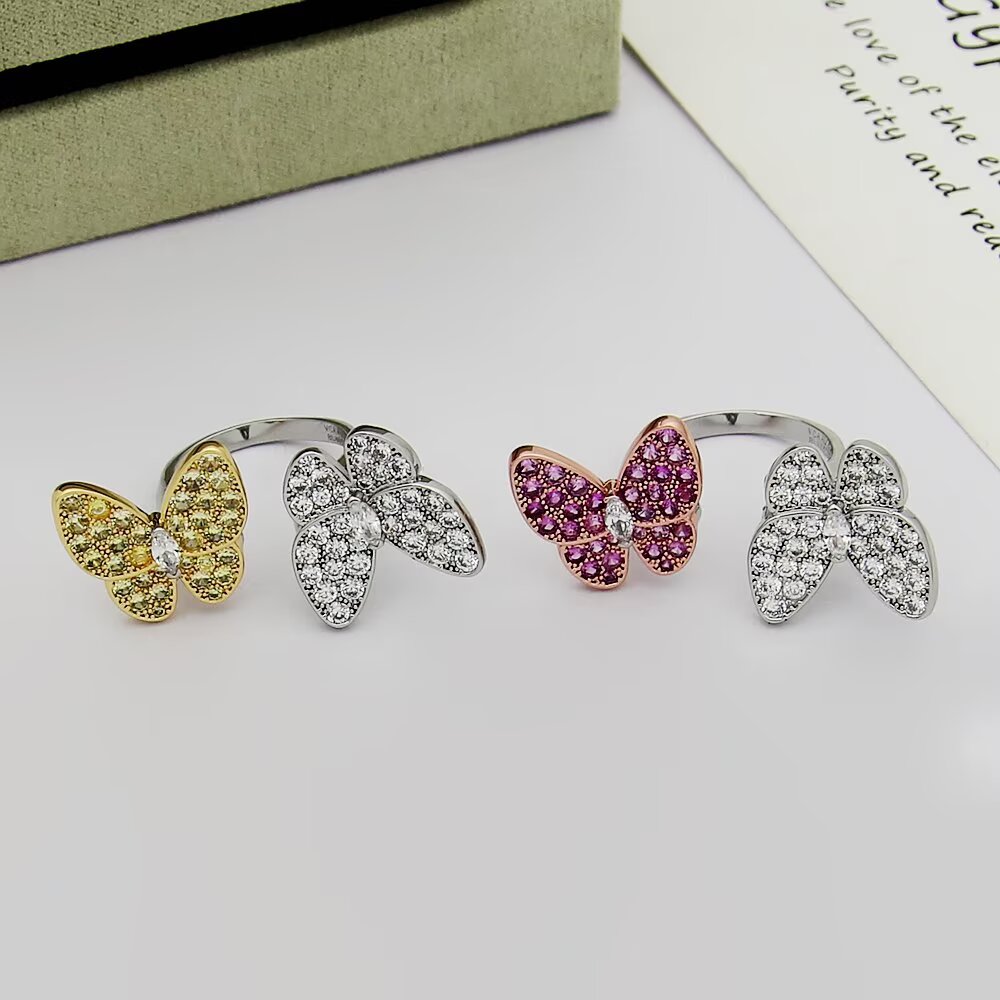 Van Cleef Arpels Two Butterfly ring 18k white gold with colorless diamonds 18k rose gold with pink sapphires 18k yellow gold with yellow sapphires US 7