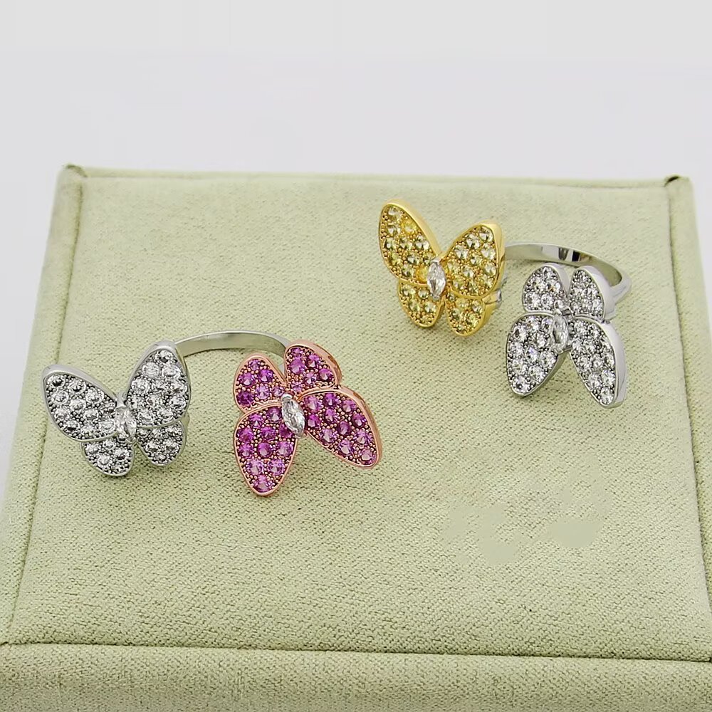 Van Cleef Arpels Two Butterfly ring 18k white gold with colorless diamonds 18k rose gold with pink sapphires 18k yellow gold with yellow sapphires US 7