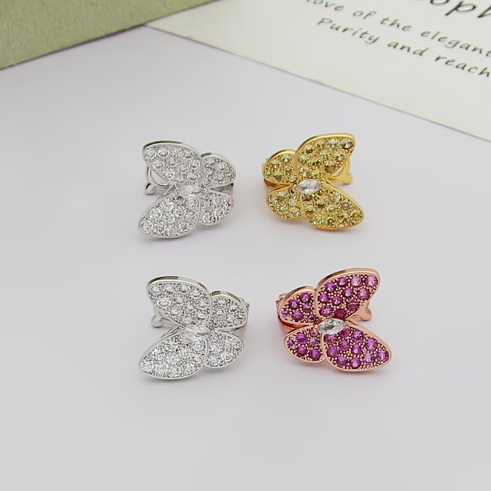 Van Cleef Arpels Two Butterfly earrings White gold with colorless diamonds yellow gold with yellow sapphires and colorless diamond rose gold with pink sapphires and colorless diamond 12mm butterfly width