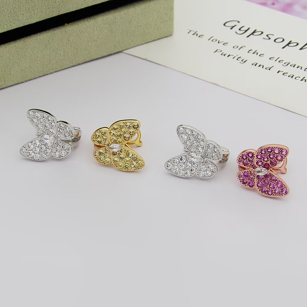 Van Cleef Arpels Two Butterfly earrings White gold with colorless diamonds yellow gold with yellow sapphires and colorless diamond rose gold with pink sapphires and colorless diamond 12mm butterfly width
