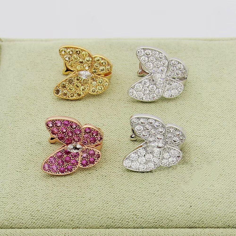Van Cleef Arpels Two Butterfly earrings White gold with colorless diamonds yellow gold with yellow sapphires and colorless diamond rose gold with pink sapphires and colorless diamond 12mm butterfly width