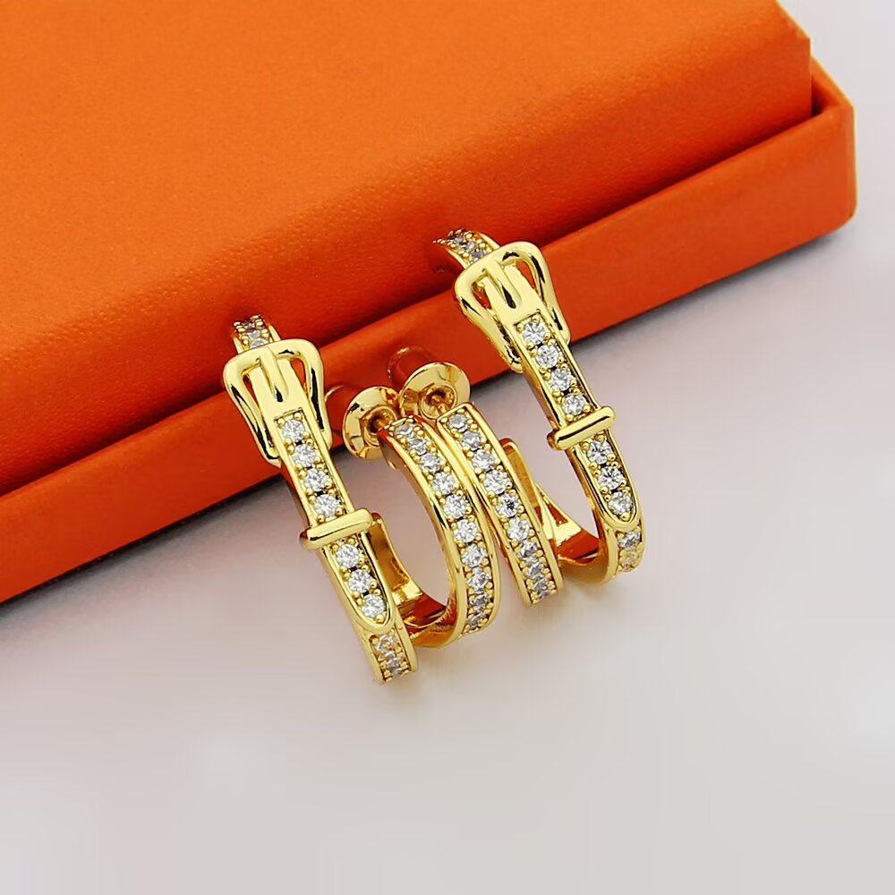 Hermes Belt Buckle Double Hoop Earrings earrings Silver-toned metal with clear pave diamonds also available in yellow gold-toned metal with clear pave diamonds rose gold-toned metal with clear pave diamonds 1 5cm outer hoop diameter