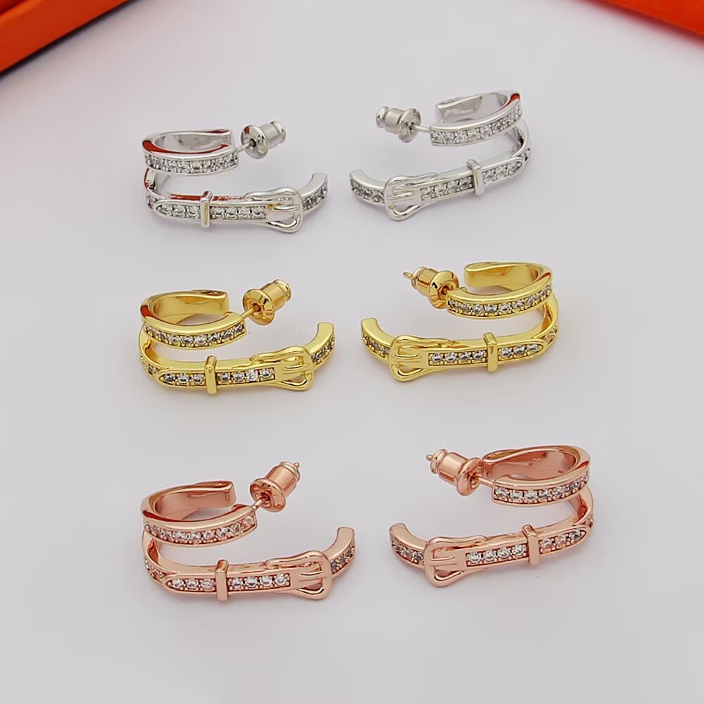 Hermes Belt Buckle Double Hoop Earrings earrings Silver-toned metal with clear pave diamonds also available in yellow gold-toned metal with clear pave diamonds rose gold-toned metal with clear pave diamonds 1 5cm outer hoop diameter