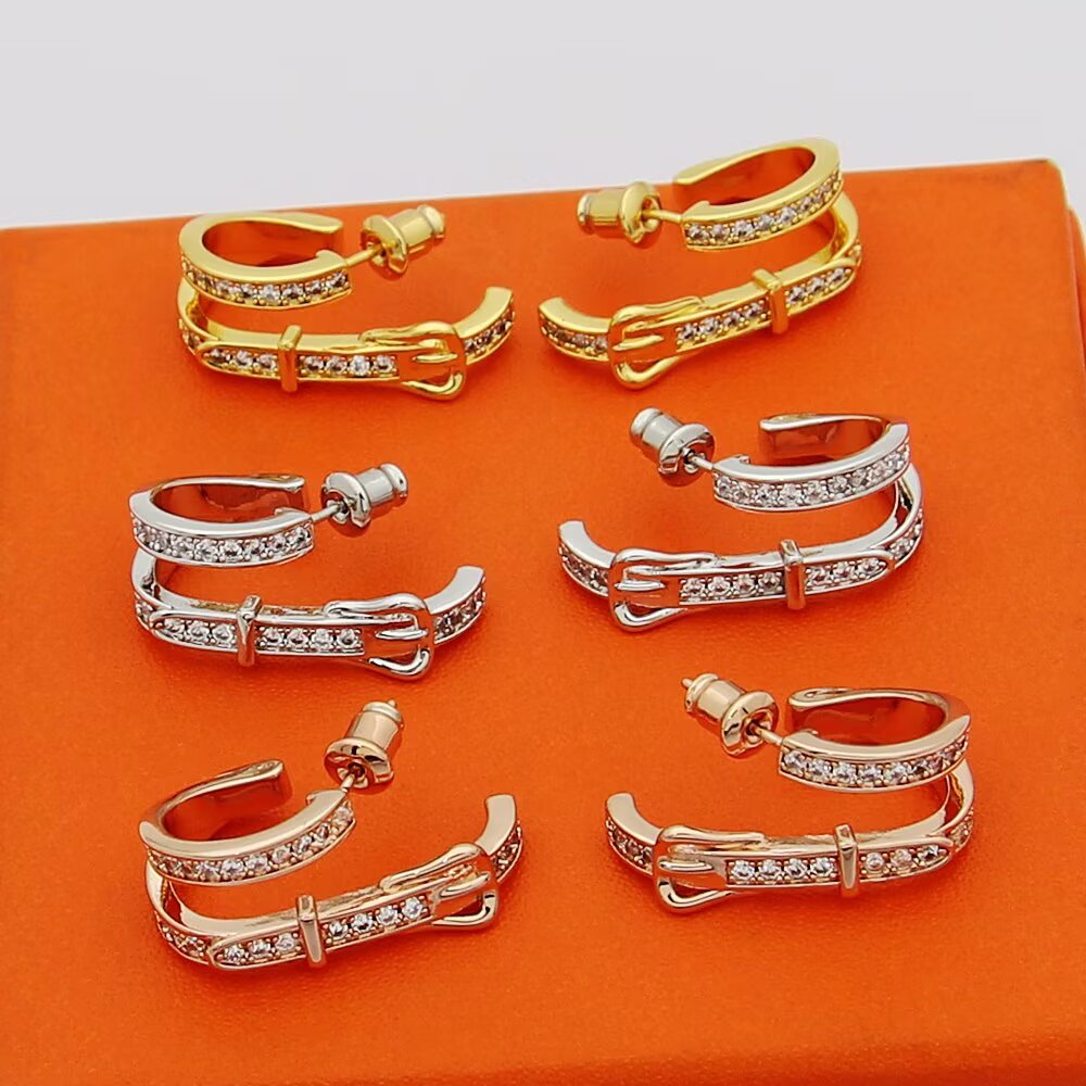 Hermes Belt Buckle Double Hoop Earrings earrings Silver-toned metal with clear pave diamonds also available in yellow gold-toned metal with clear pave diamonds rose gold-toned metal with clear pave diamonds 1 5cm outer hoop diameter