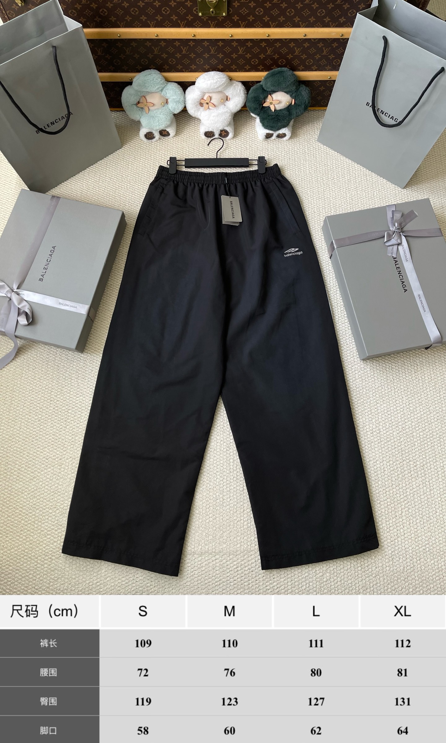 Logo-Tape Wide-Leg Track Pants — product photograph