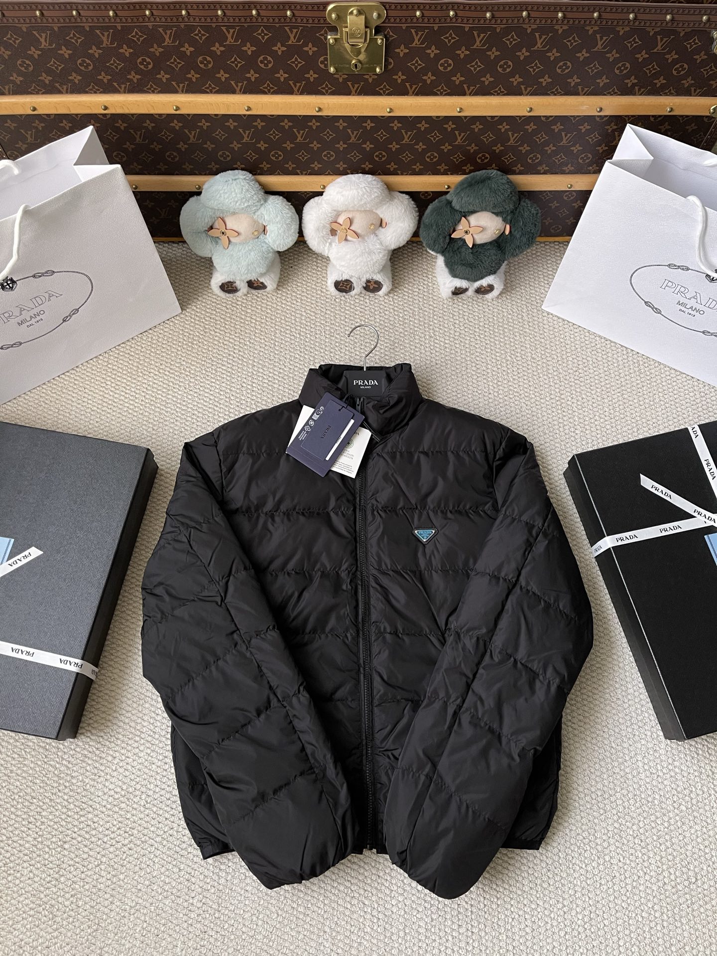 Triangle-Badge Zip-Pocket Puffer — product photograph