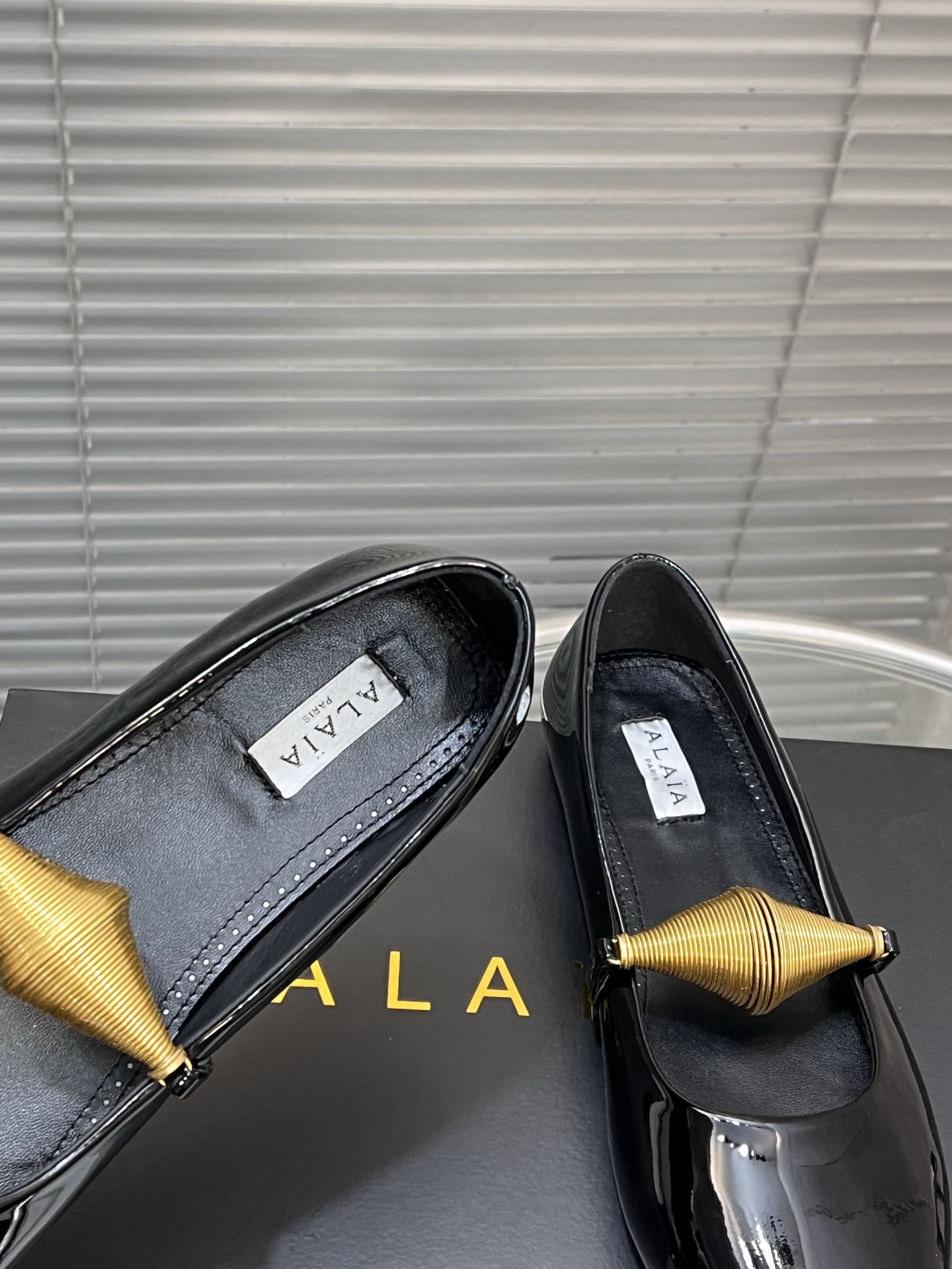 Alaia Women's Black Patent Leather Ballet Flats with Gold Accent 7 i1745378795864 850 0 5
