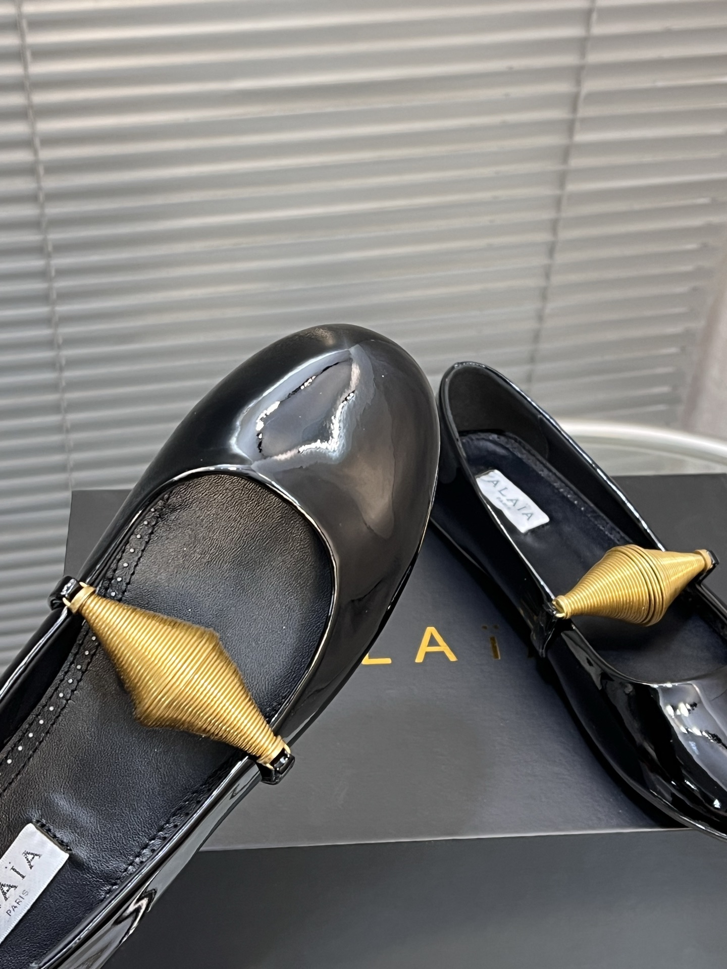 Alaia Women's Black Patent Leather Ballet Flats with Gold Accent 8 i1745378805861 7284 0 6