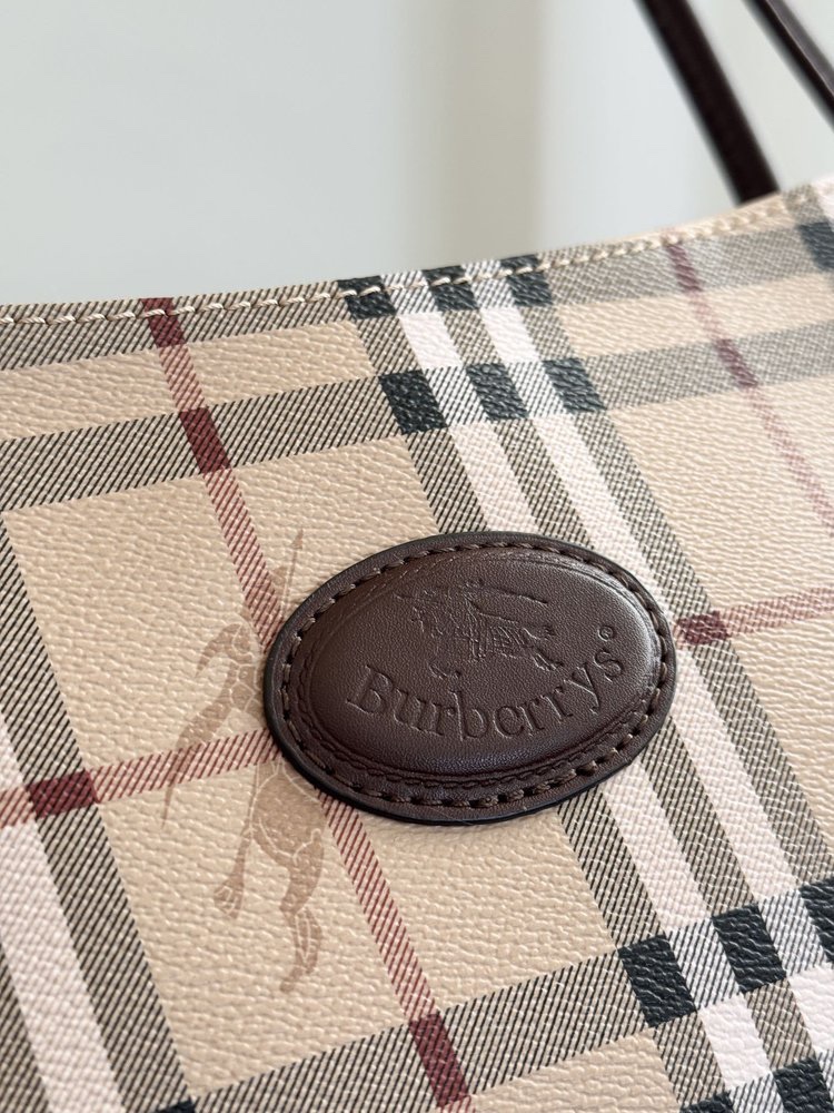 this bag is crafted from classic heritage check canvas paired with dark - Comprehensive
