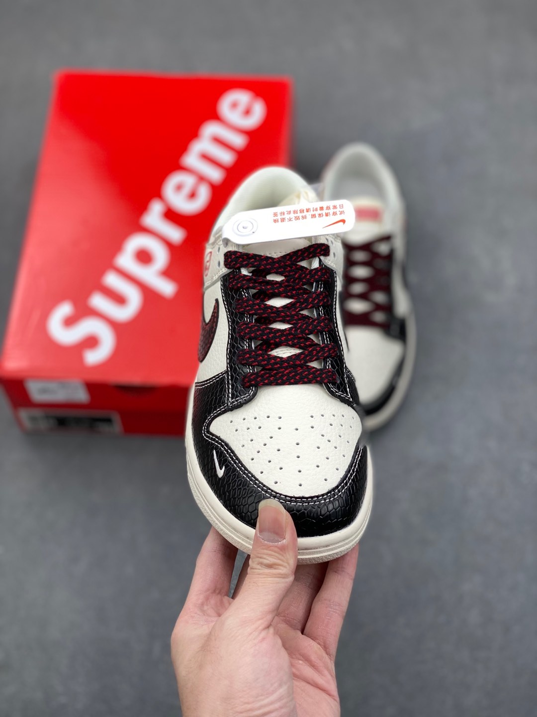 Nike SB Dunk Low x Supreme 'Year of the Snake' White Black Sneakers 3 i1735328586819 8950 0 1