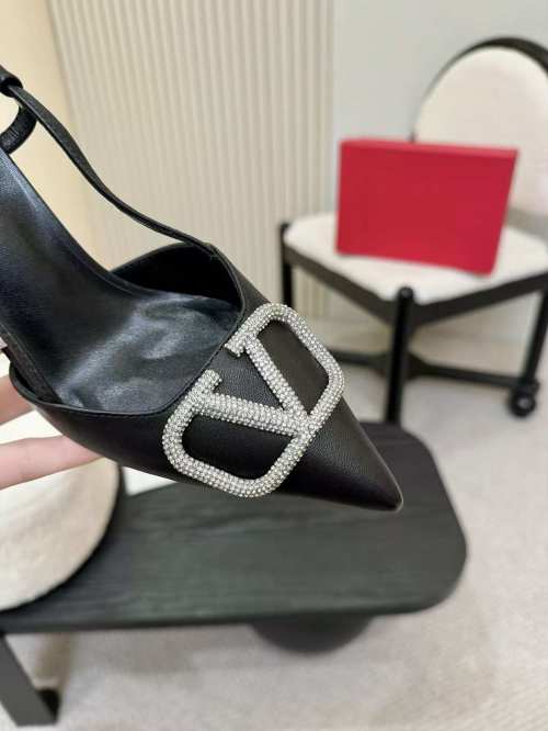 Valentino Garavani Women's Black Leather Slingback Pumps with Rhinestone V Logo 1 Valentino Garavani Women's Black Leather Slingback Pumps with Rhinestone V Logo