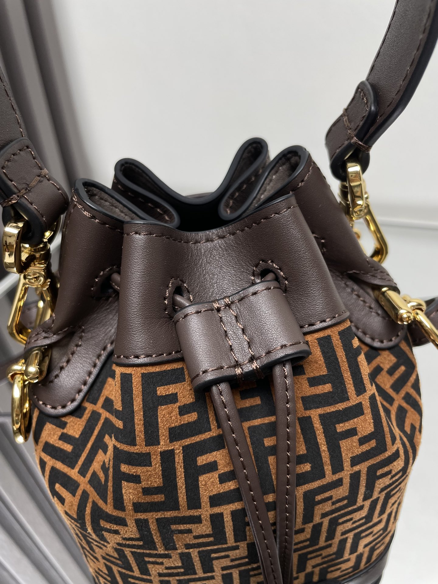 Fendi Mon Tresor Mini Bucket Bag with FF Suede – Iconic Design, Compact Size 3 i1712413806 4479 7