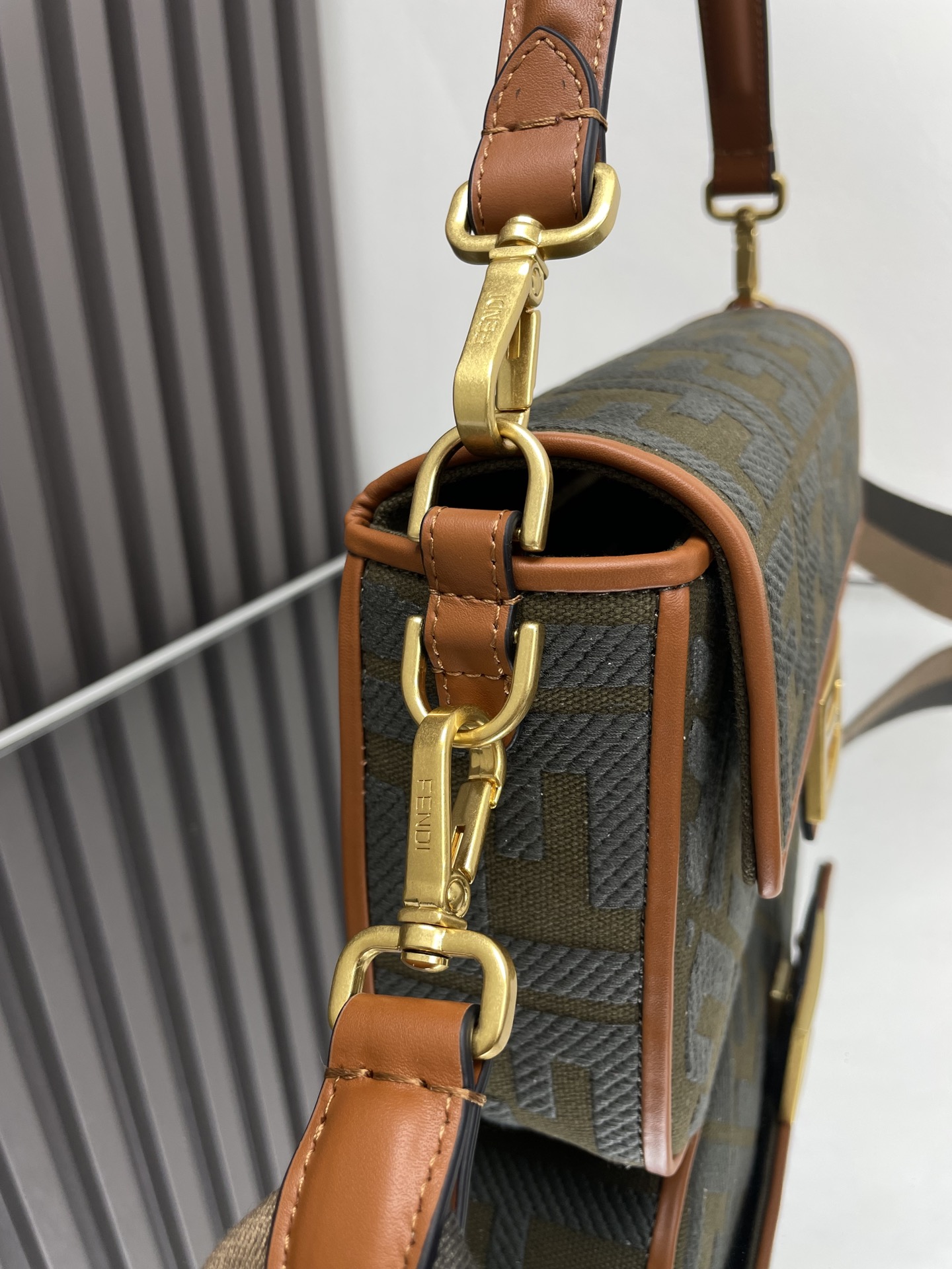 Fendi Baguette Bag with FF Motif and Adjustable Shoulder Strap 4 i1712762756 385 1